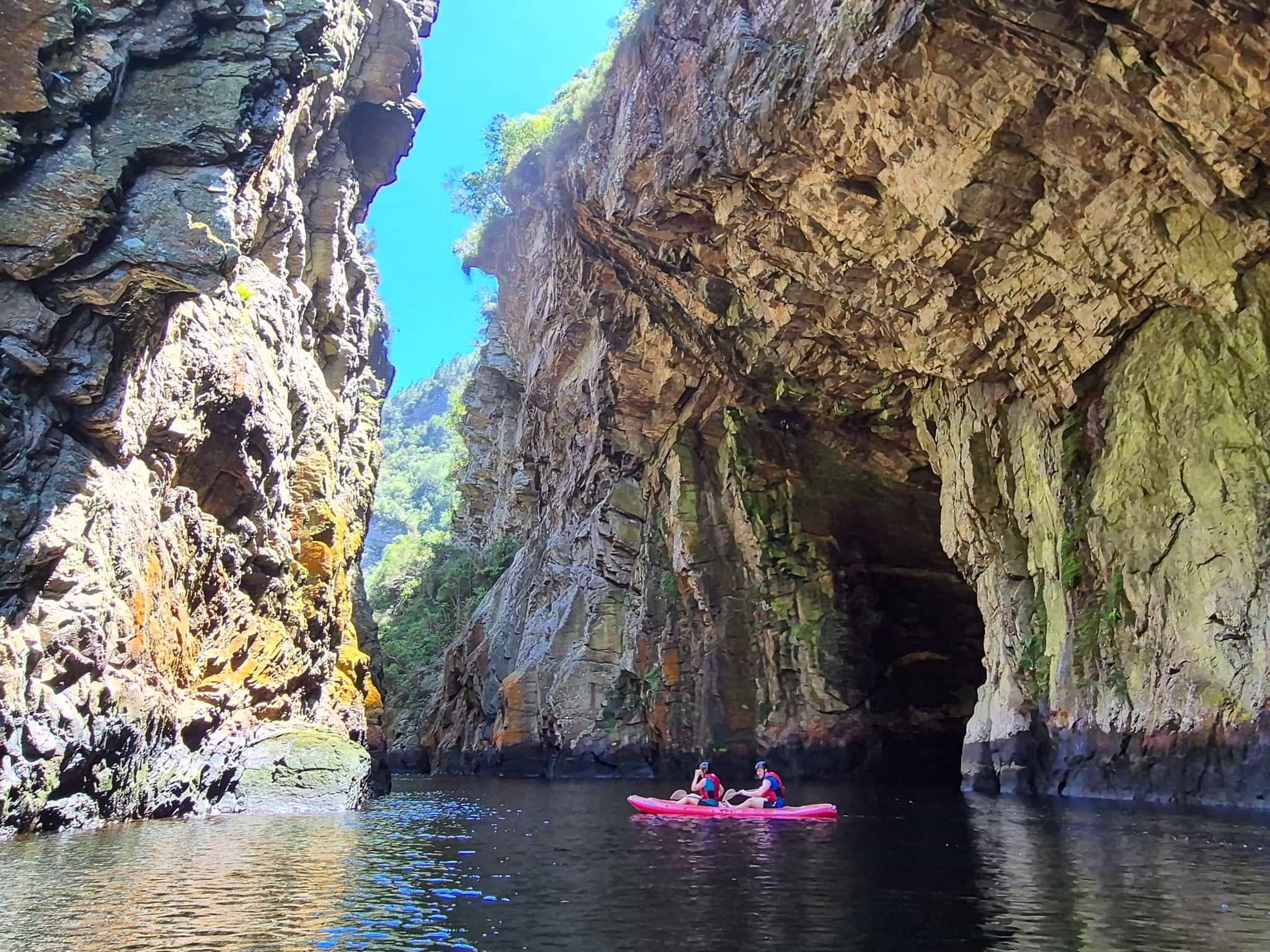 Kayaking Storms River Mouth in Tsitsikamma National Park, South Africa.