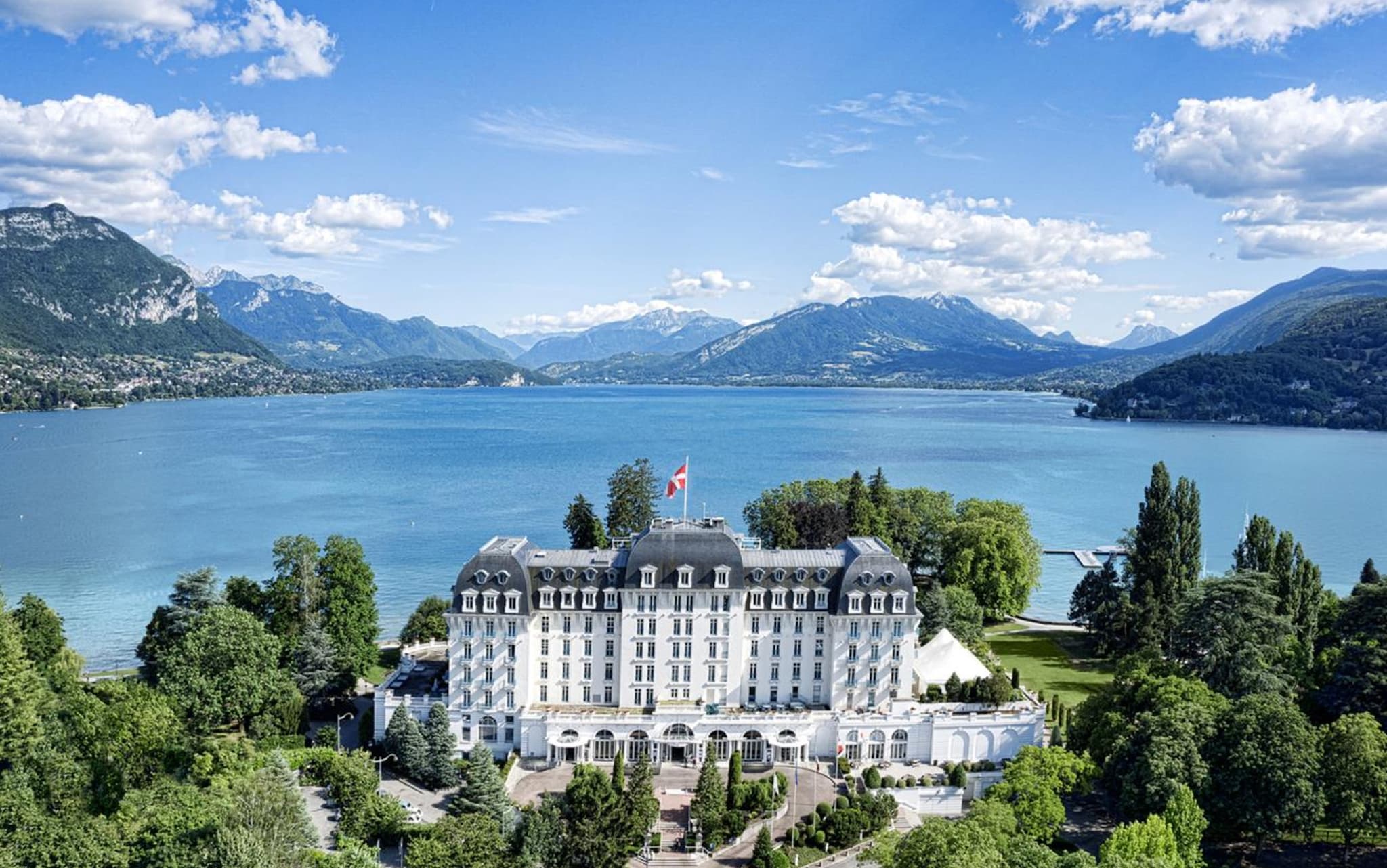 Aerial view of the Imperial Palace Hotel overlooking Lake Annecy