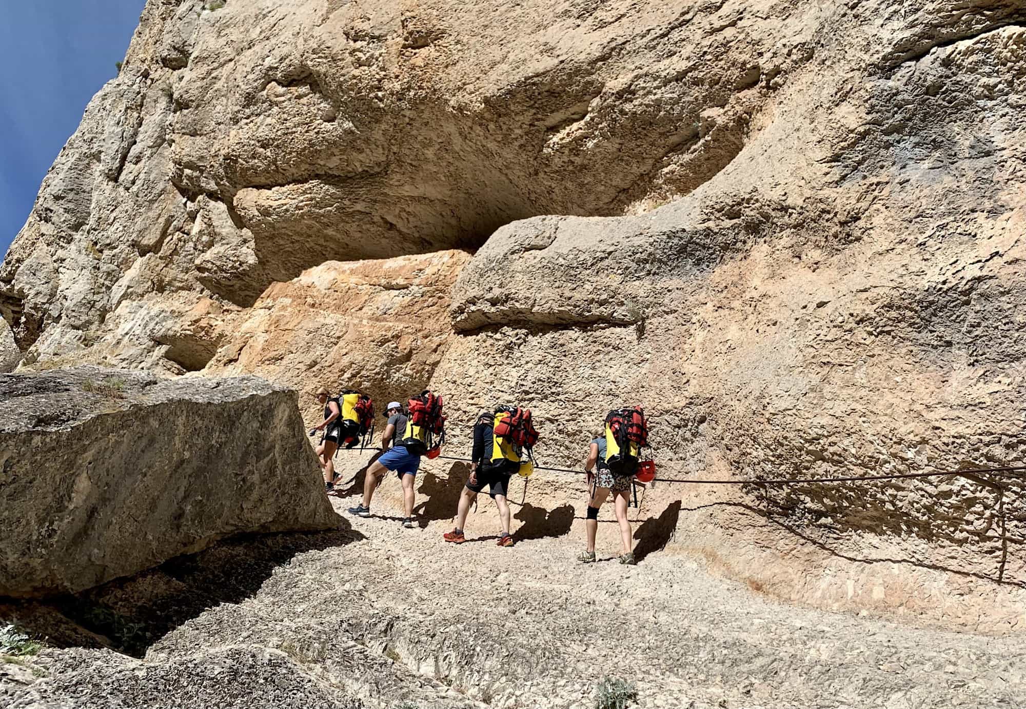 4 people hiking.