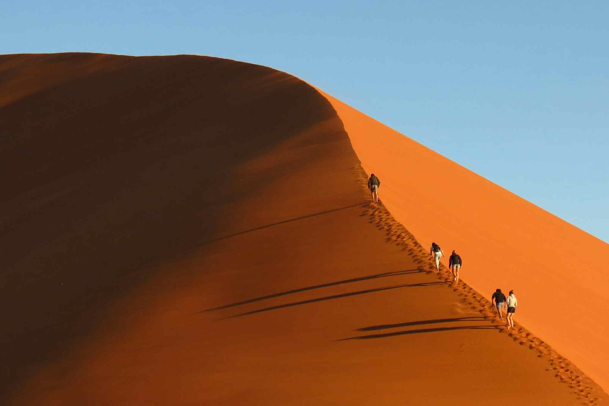 https://www.canva.com/photos/MAD-02pvTq4-landscape-sand-dunes-45-namibia-sossusvlei-africa-hiking-outside-uphill-shadows-people/