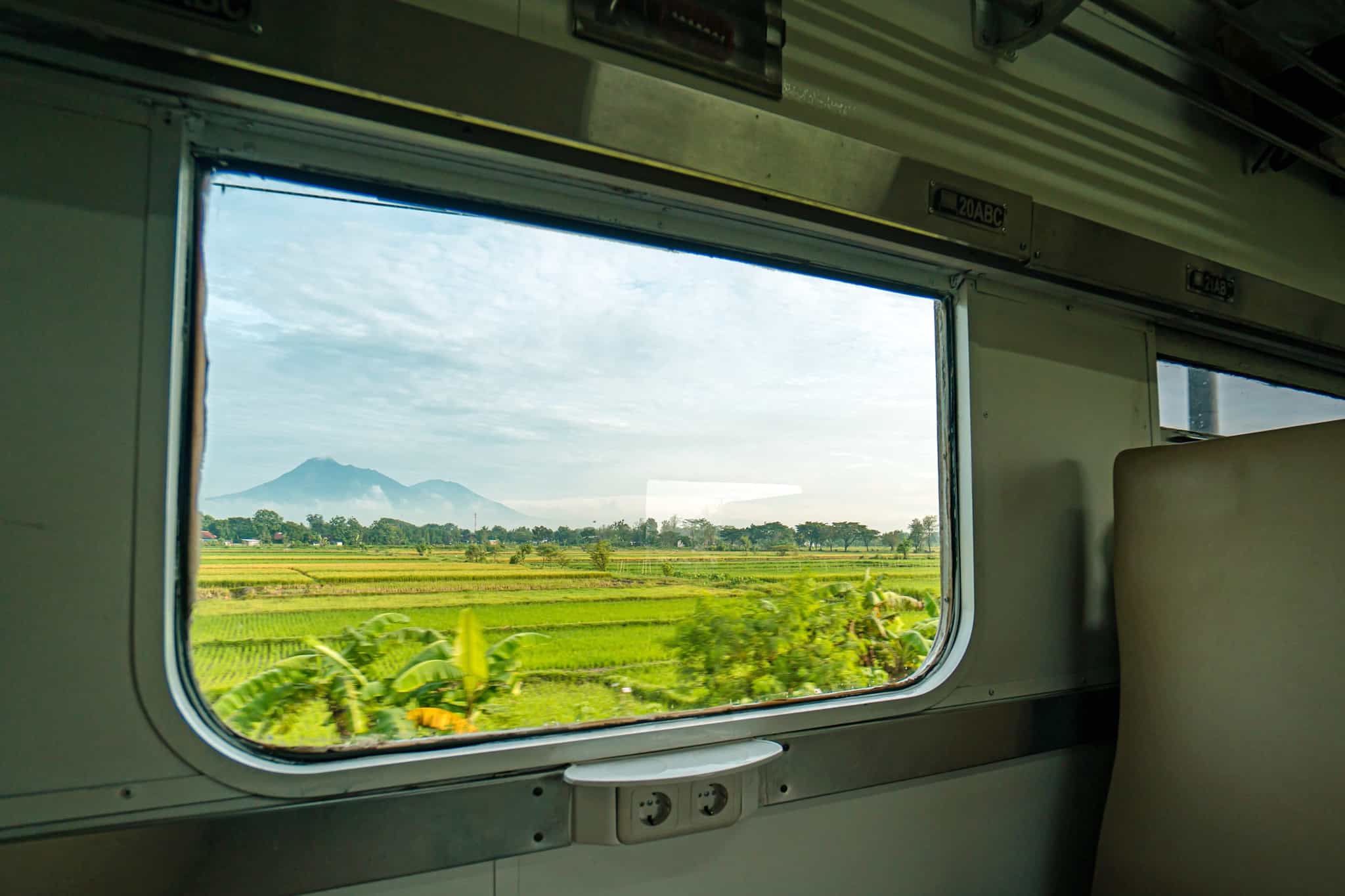 Looking out on Java from a train window in Indonesia.