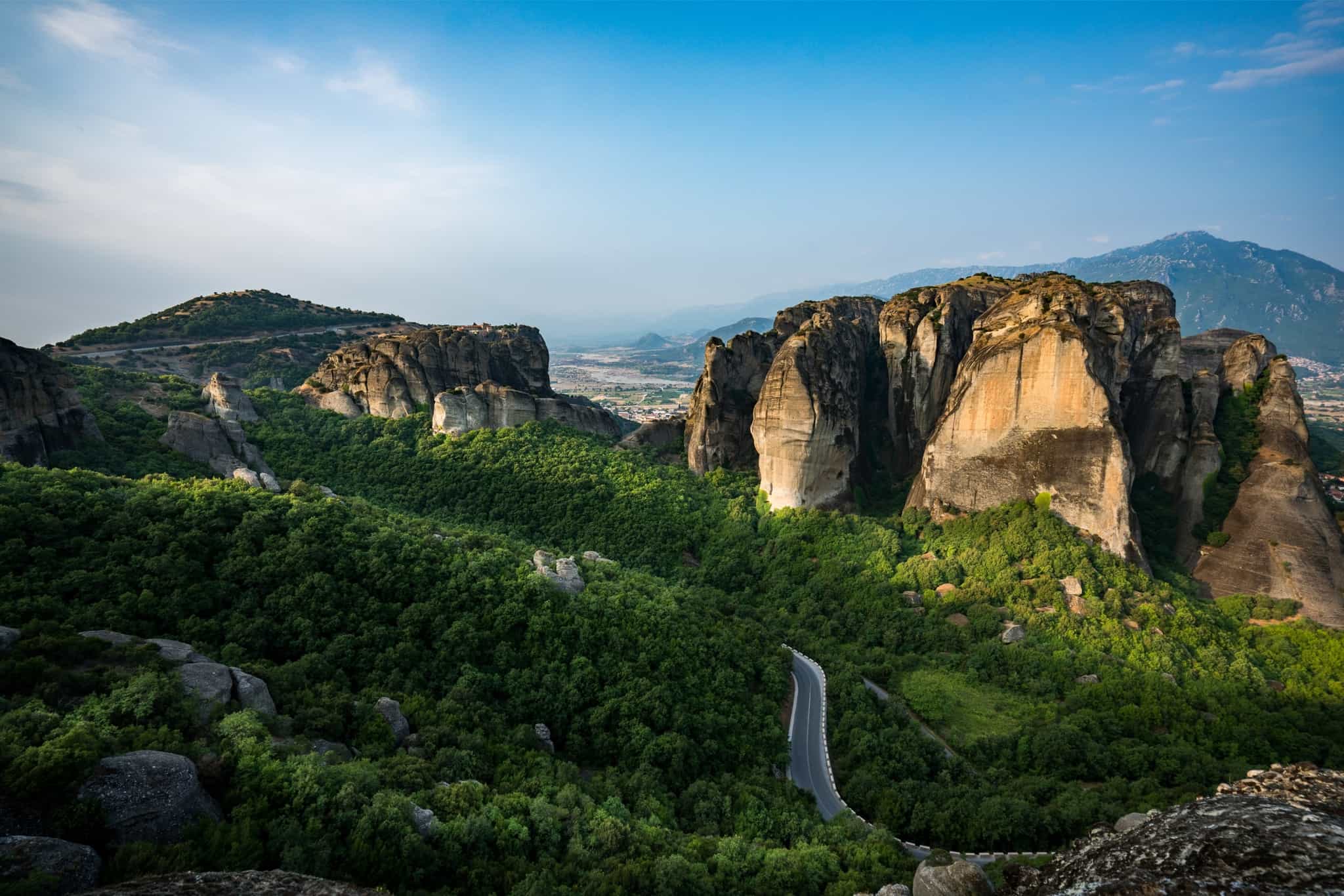 Meteora road, Greece. Photo: Canva - https://www.canva.com/photos/MAD3vg2Y4K0-the-road-ii-meteora-greece/