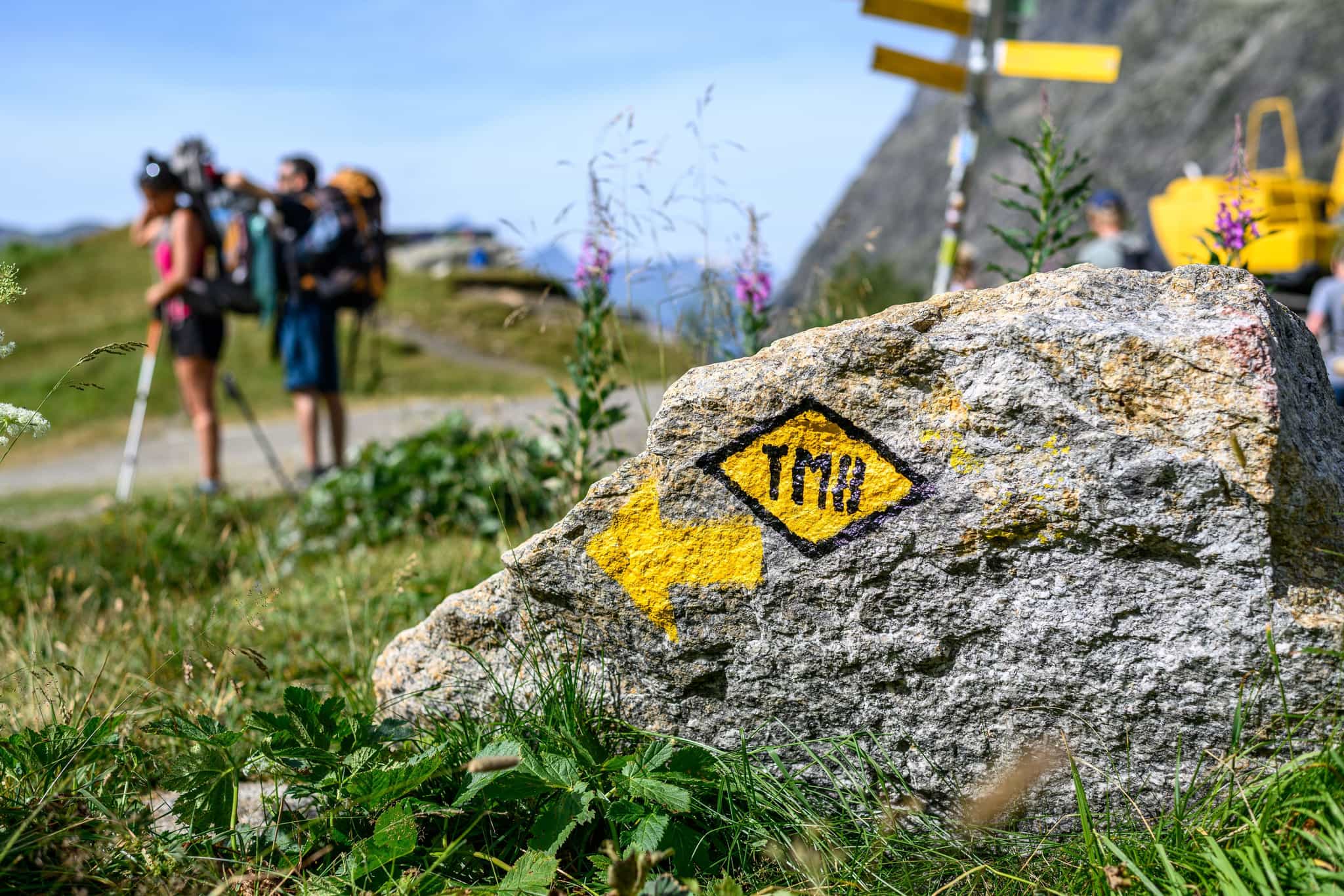 Sign painted on the rock on the Tour du Mont Blanc