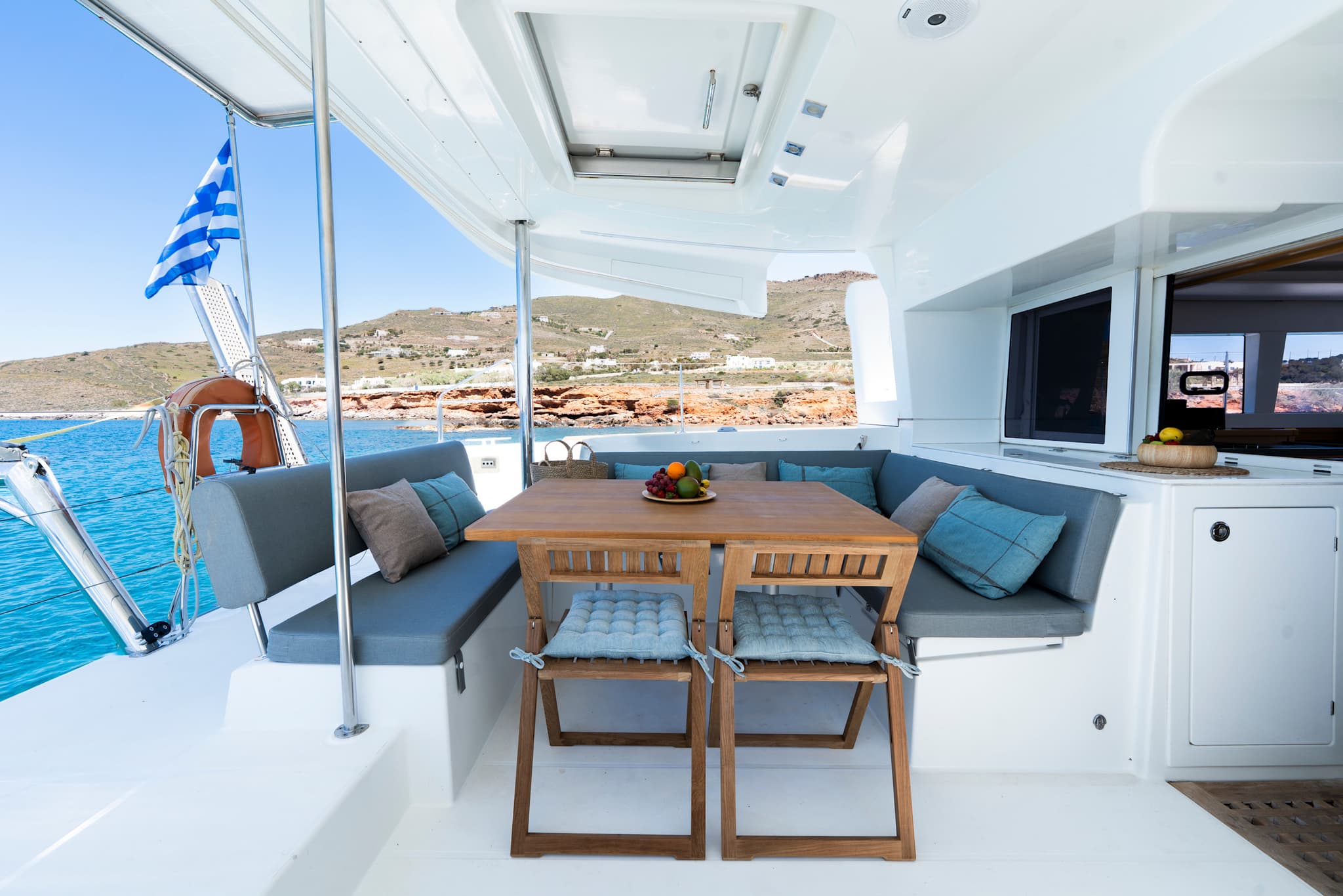 Lounge on the sailboat in the Cyclades Islands, Greece.