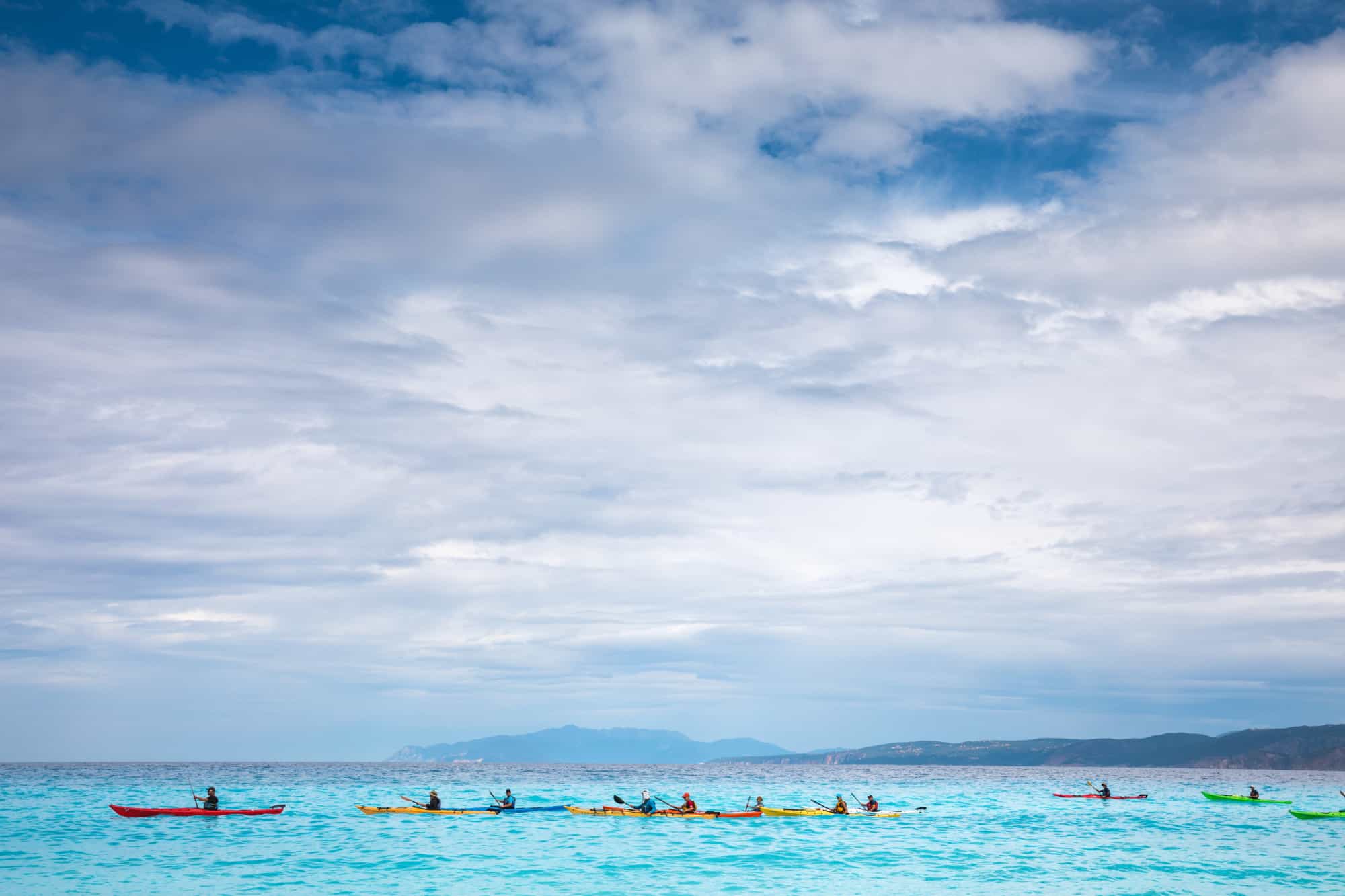 Sea kayaks on the turquoise waters of the Greek Ionian islands.