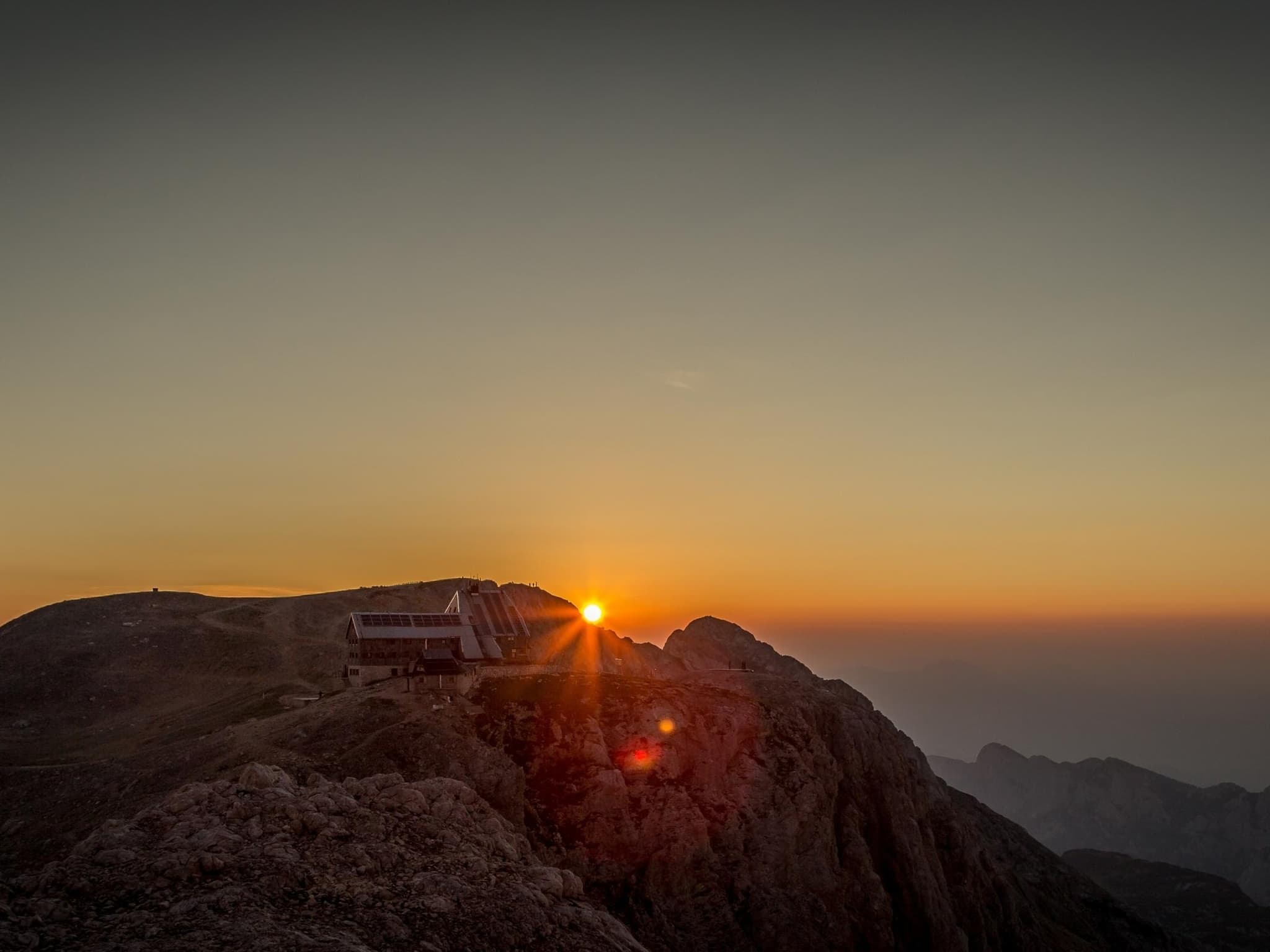 Sunrise over Kredarica on Mount Triglav, Slovenia.