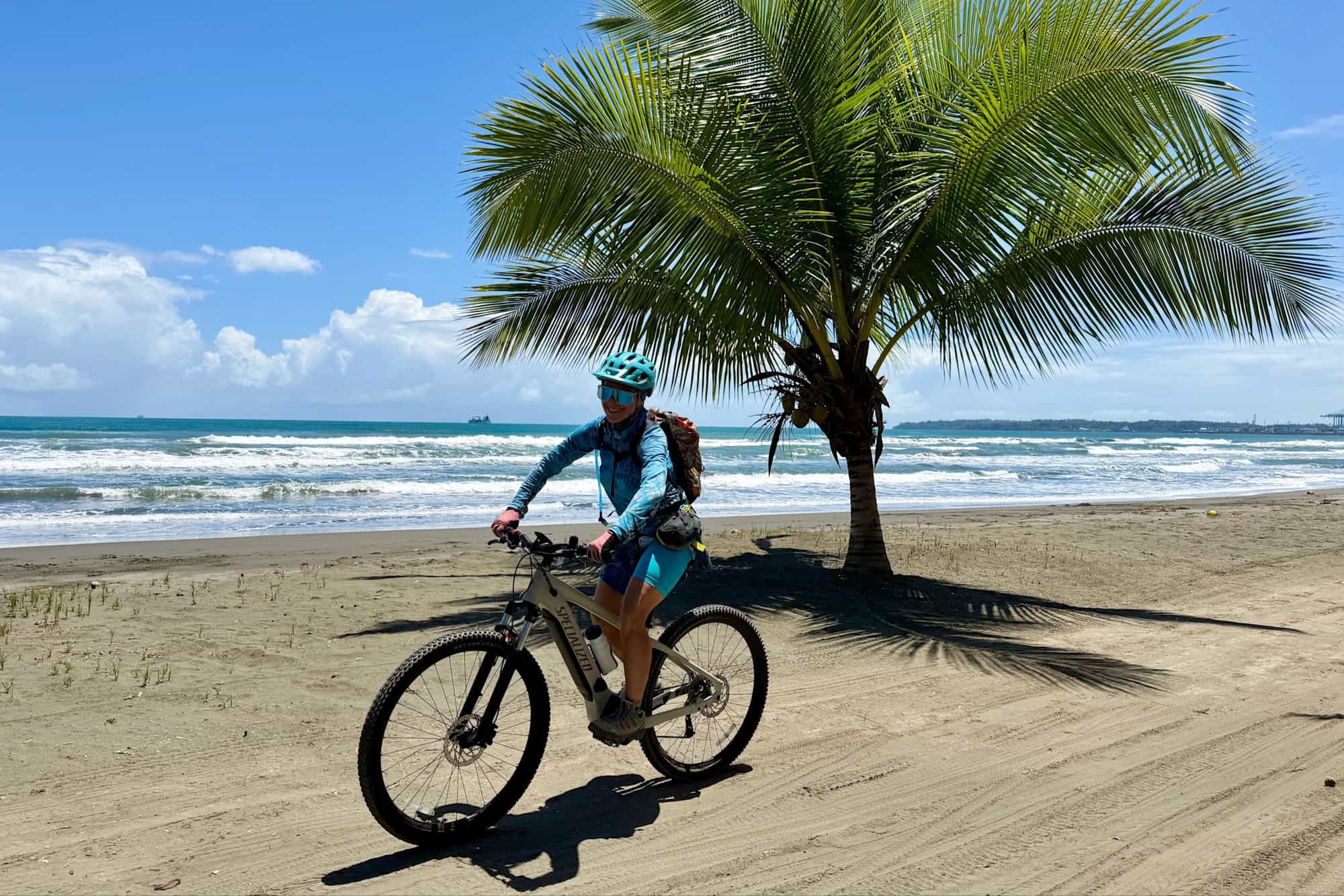A woman on an e-bike on the Caribbean Coast in Costa Rica