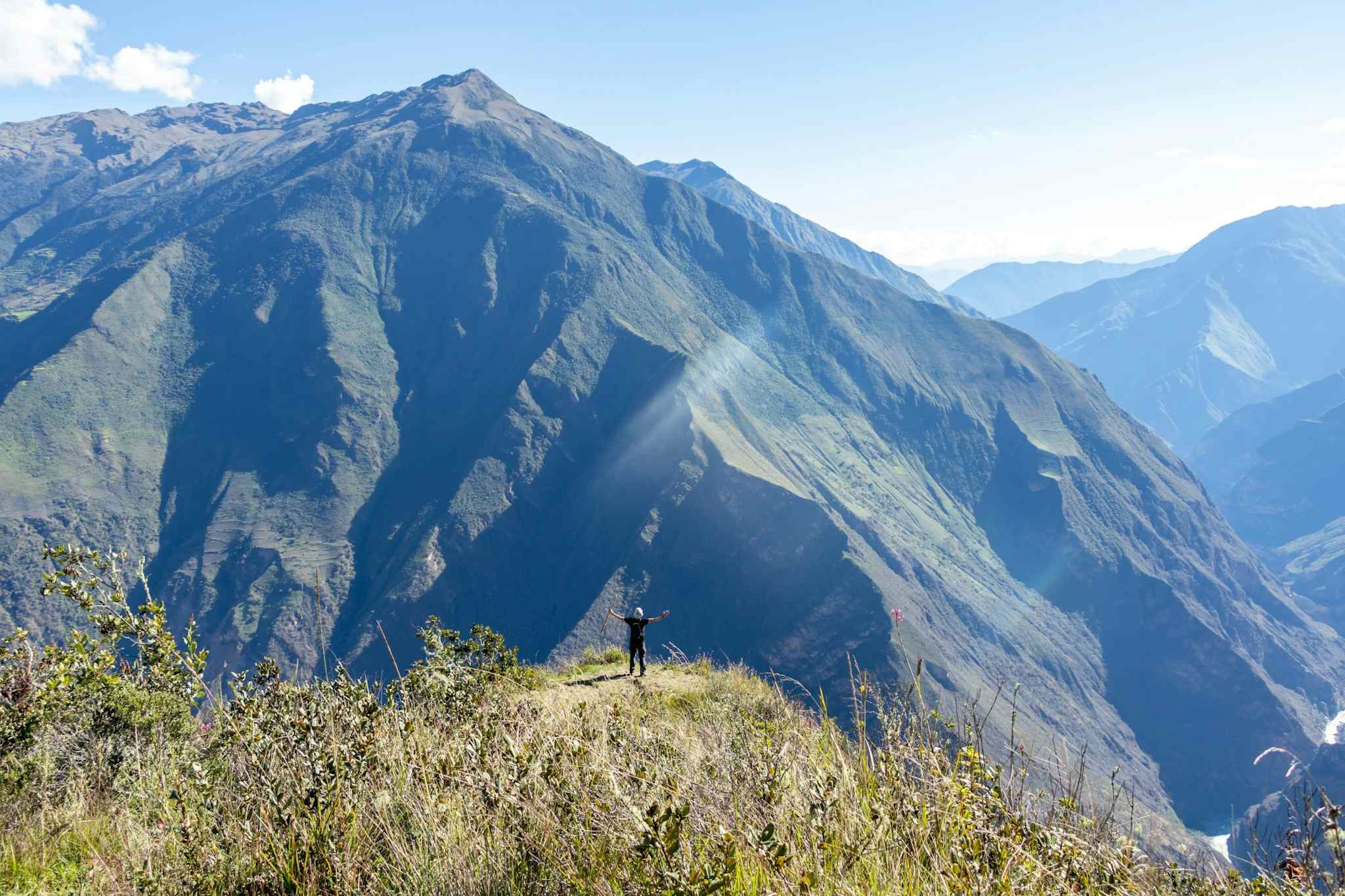 Hiker above the Apurimac Canyon on the Choquequirao Trek Photo: Canva link: https://www.canva.com/photos/MADnMxovDSE-young-hiker-man-trekking-with-backpack-in-peruvian-andes-mountains-peru-south-america/