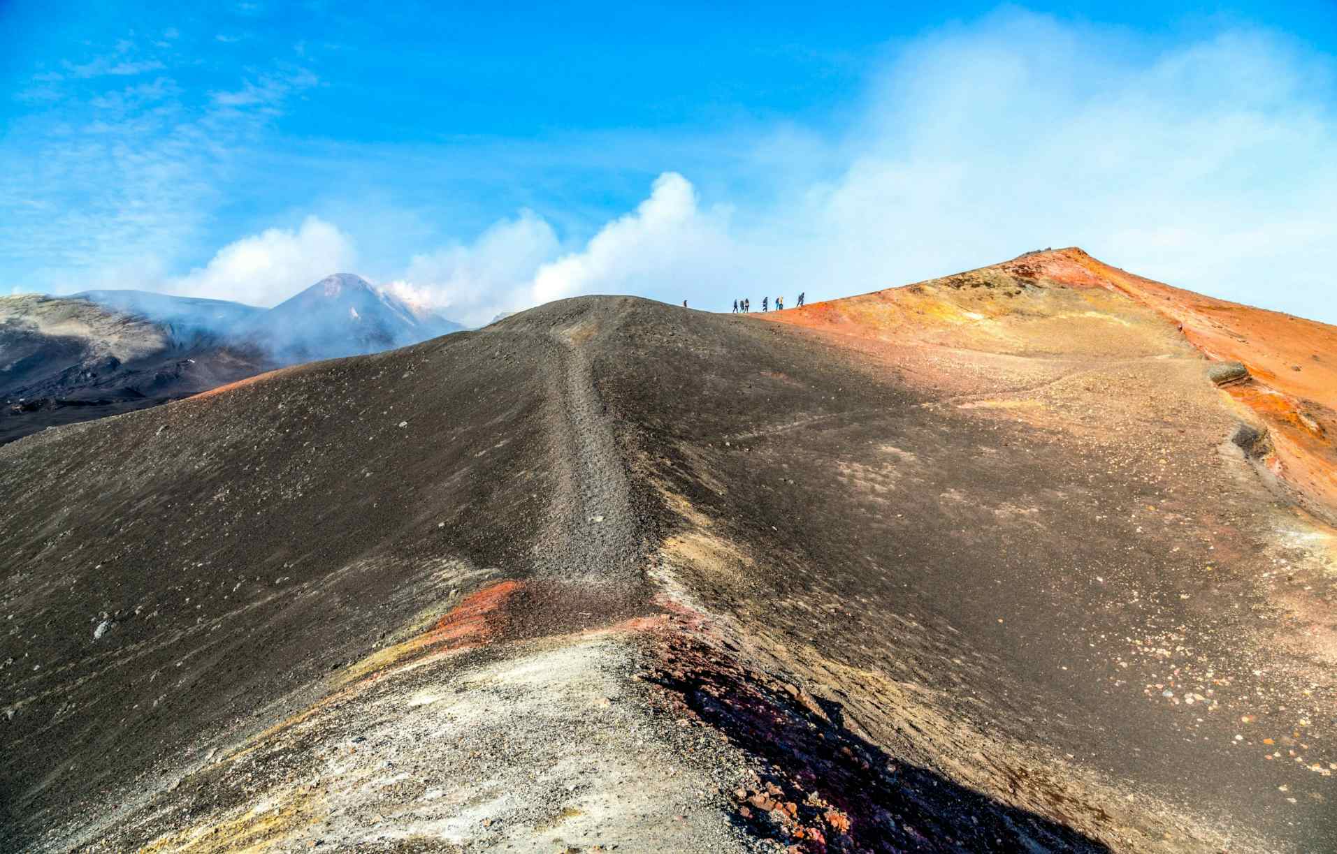 Hikers on Crater of Mount Etna, Sicily. Photo: Shutterstock 179367866