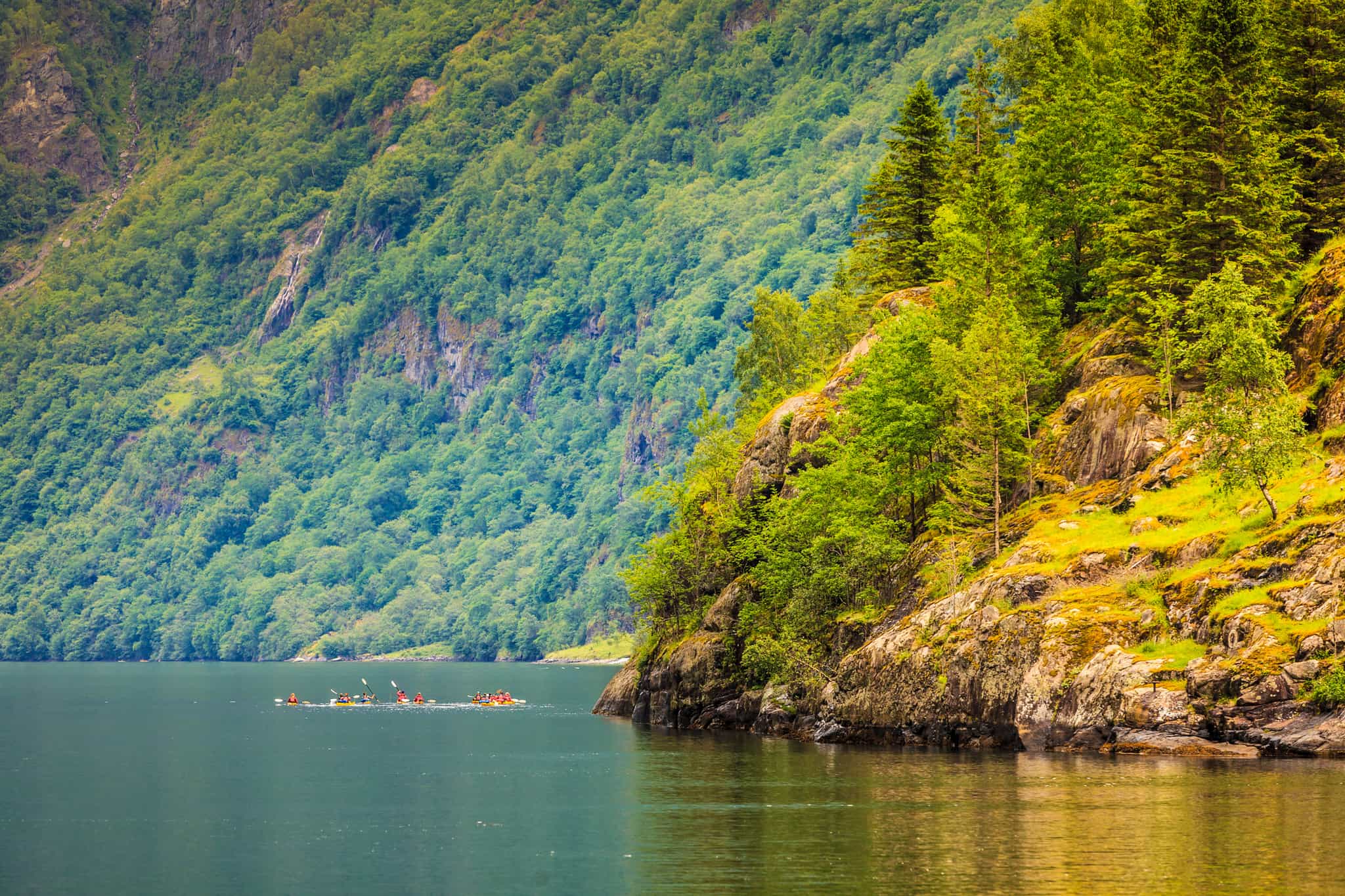 Kayakers on the Sognefjord in the Norwegian Fjords.
