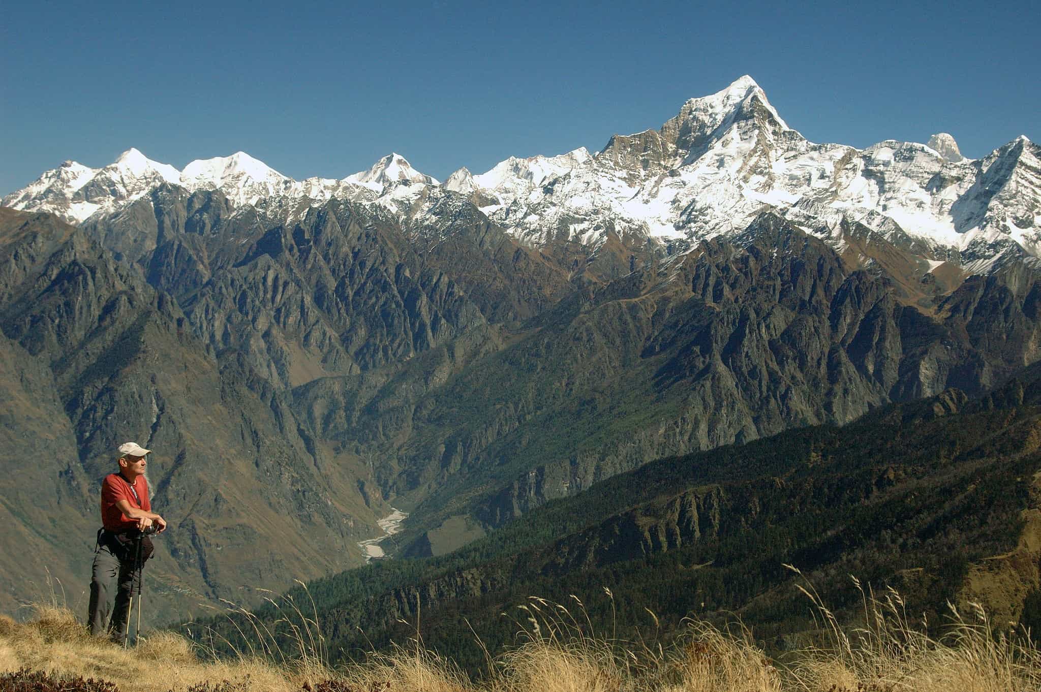 Hiker overlooking a Gharwal Panorama, India. Photo: Host/KVT India