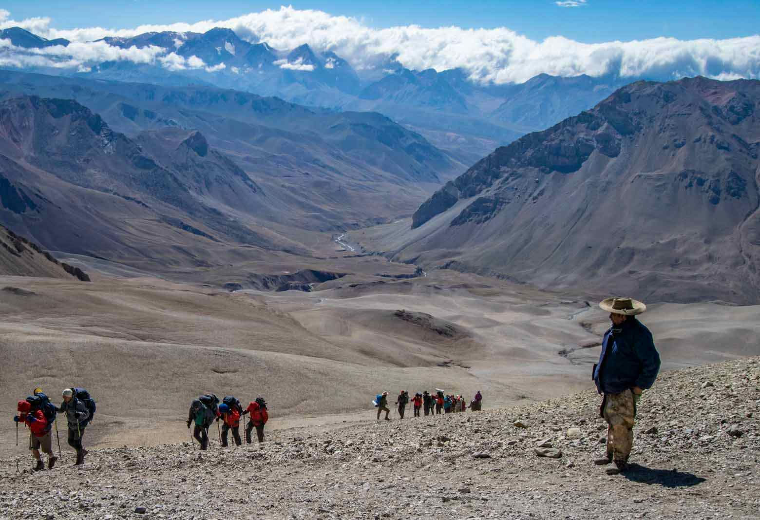 Group ascending a hill, Andes-Vertical