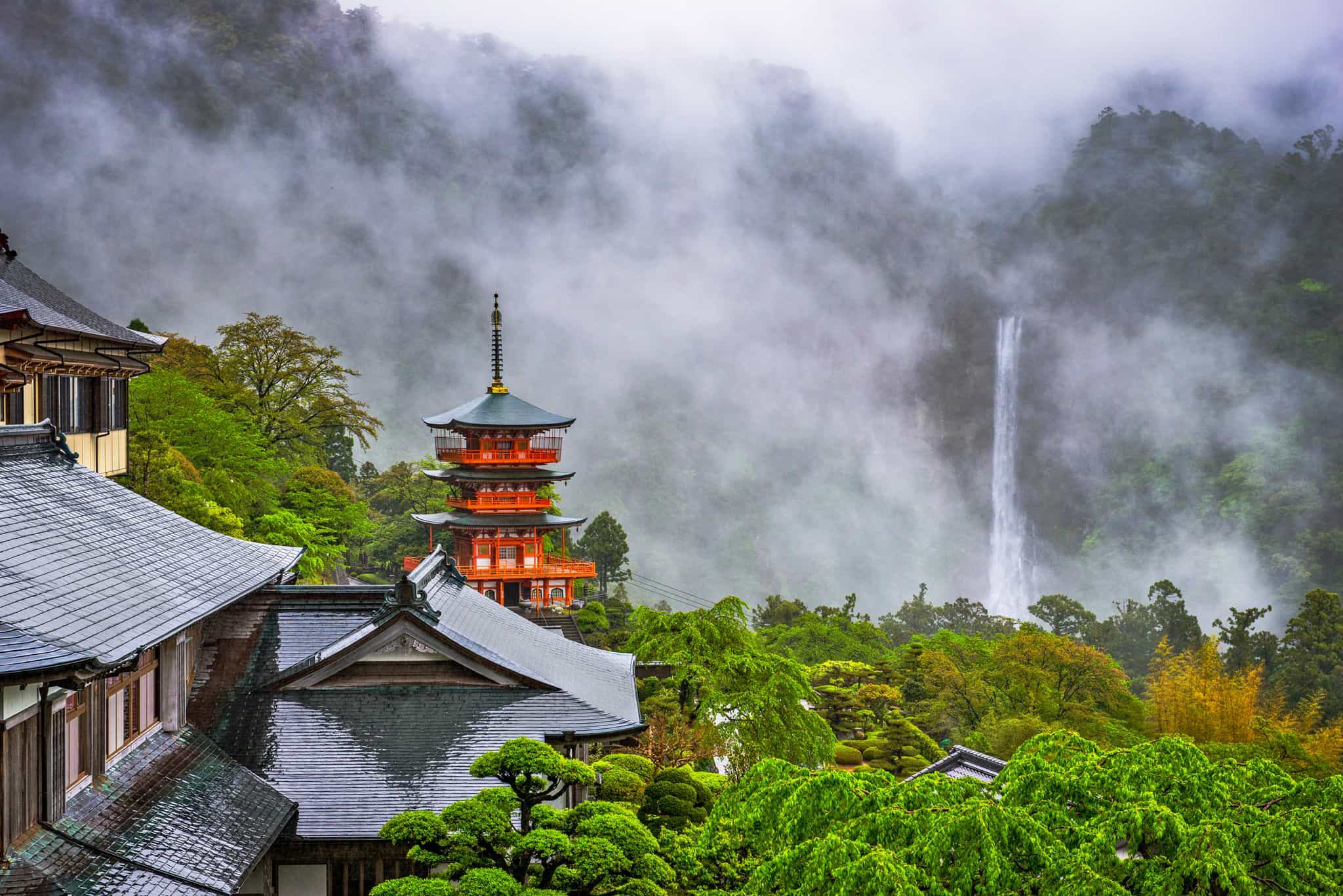 Three-story Sanjudo pagoda of Seiganto-ji temple and Nachi falls, Japan. Photo: GettyImages-1482248139