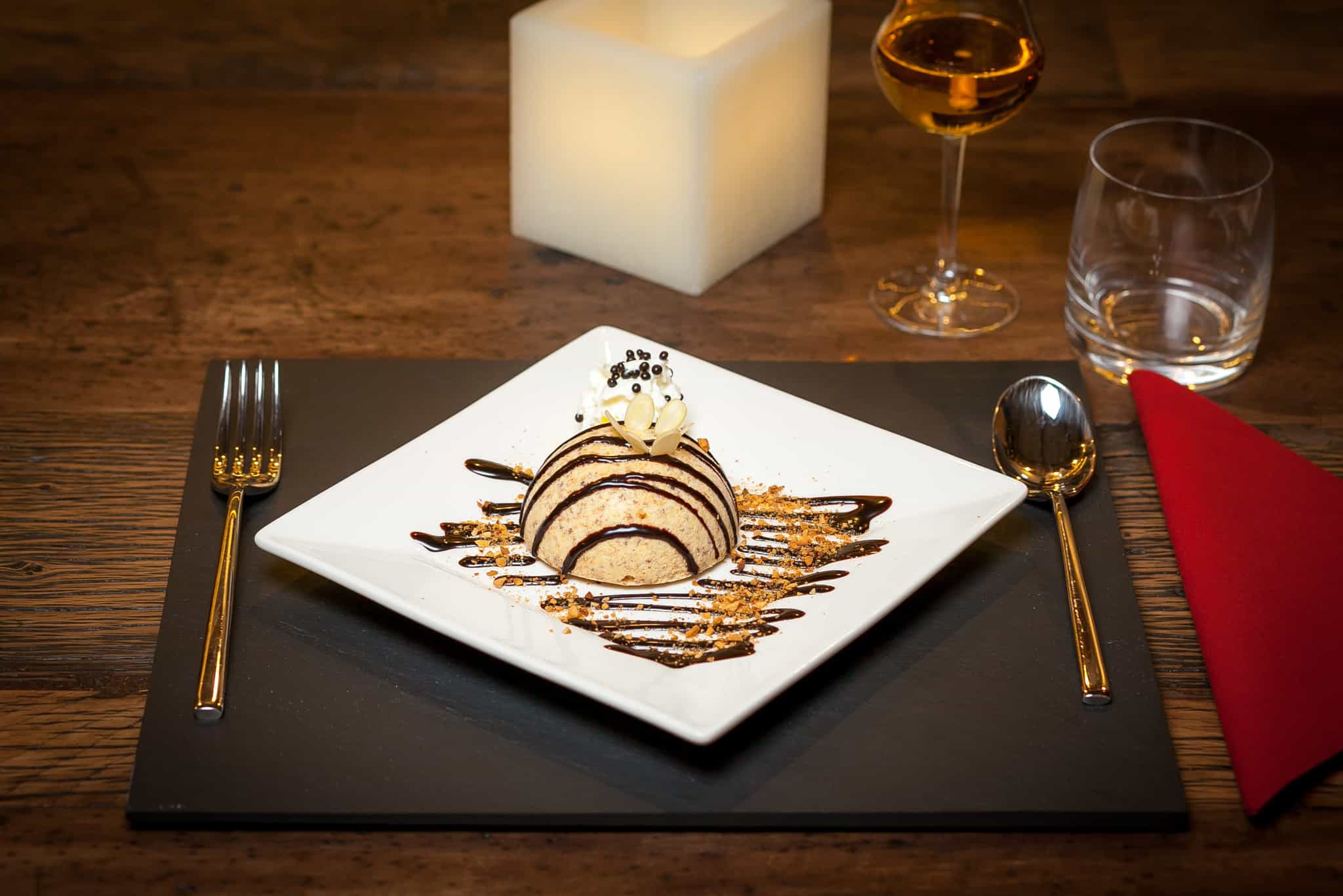 Elegant dessert plate at Hotel Lo Scoiattolo