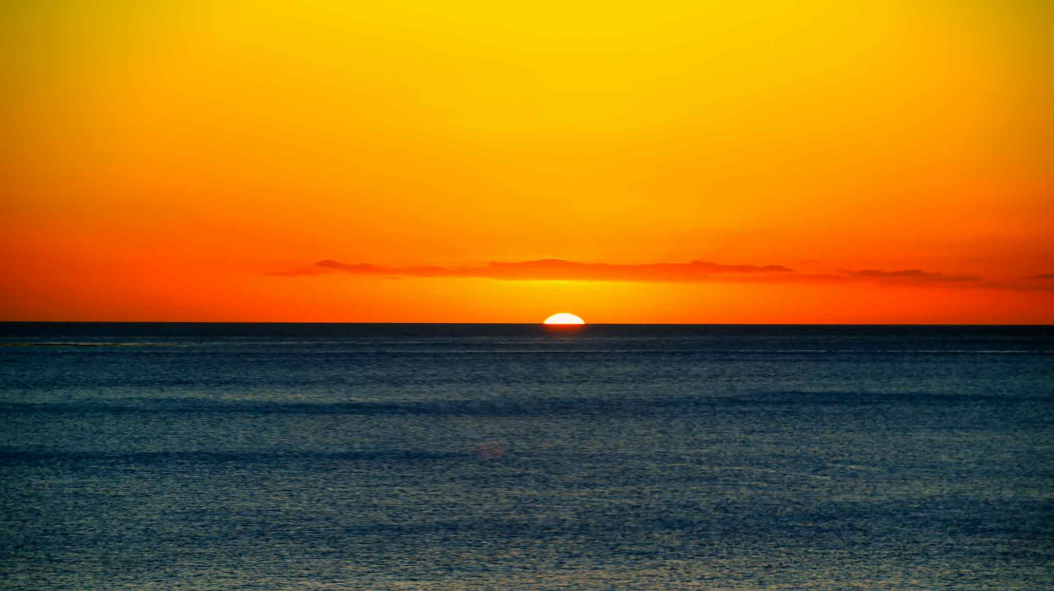 Sunset on Dominica in the Caribbean. Photo: GettyImages-1396513577