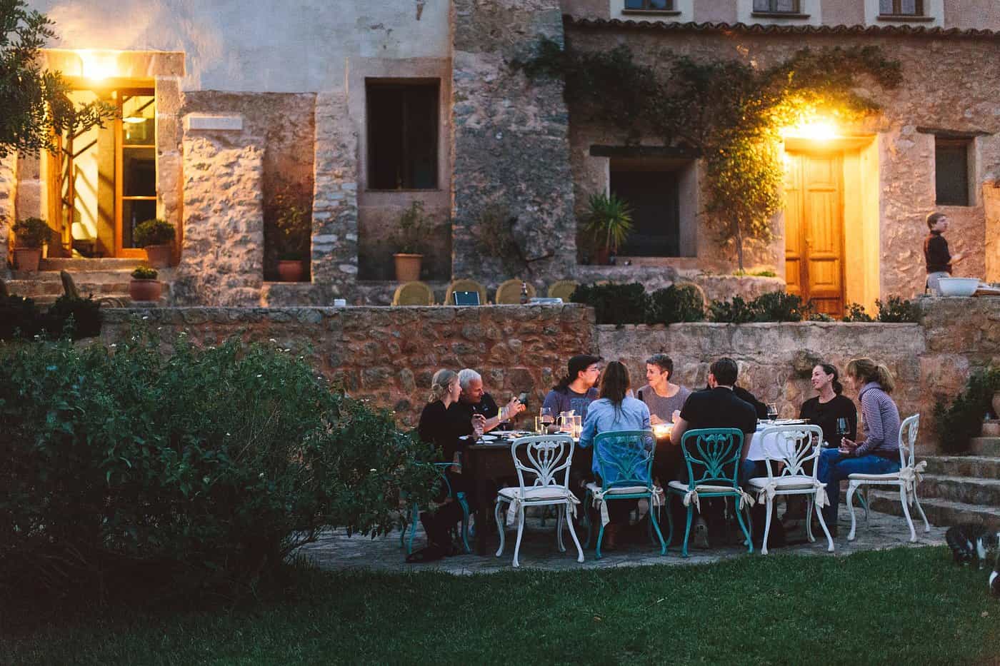 Group dining outside at the Can Torna, Mallorca.