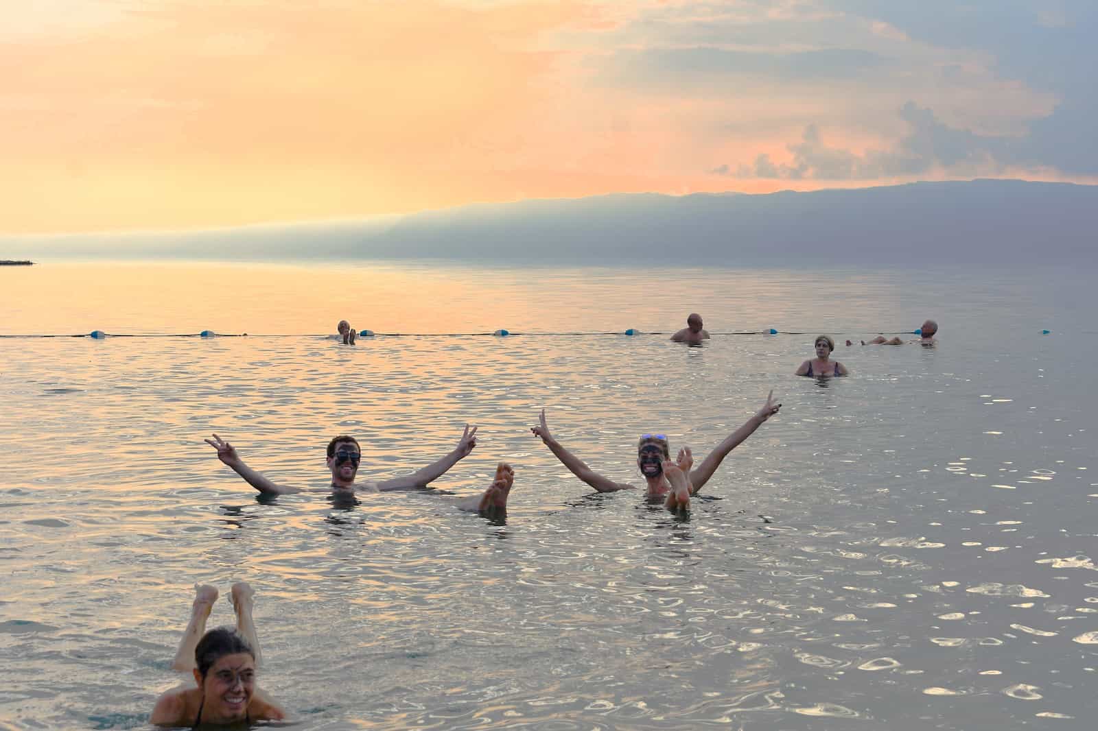 People floating in Dead Sea in Jordan.