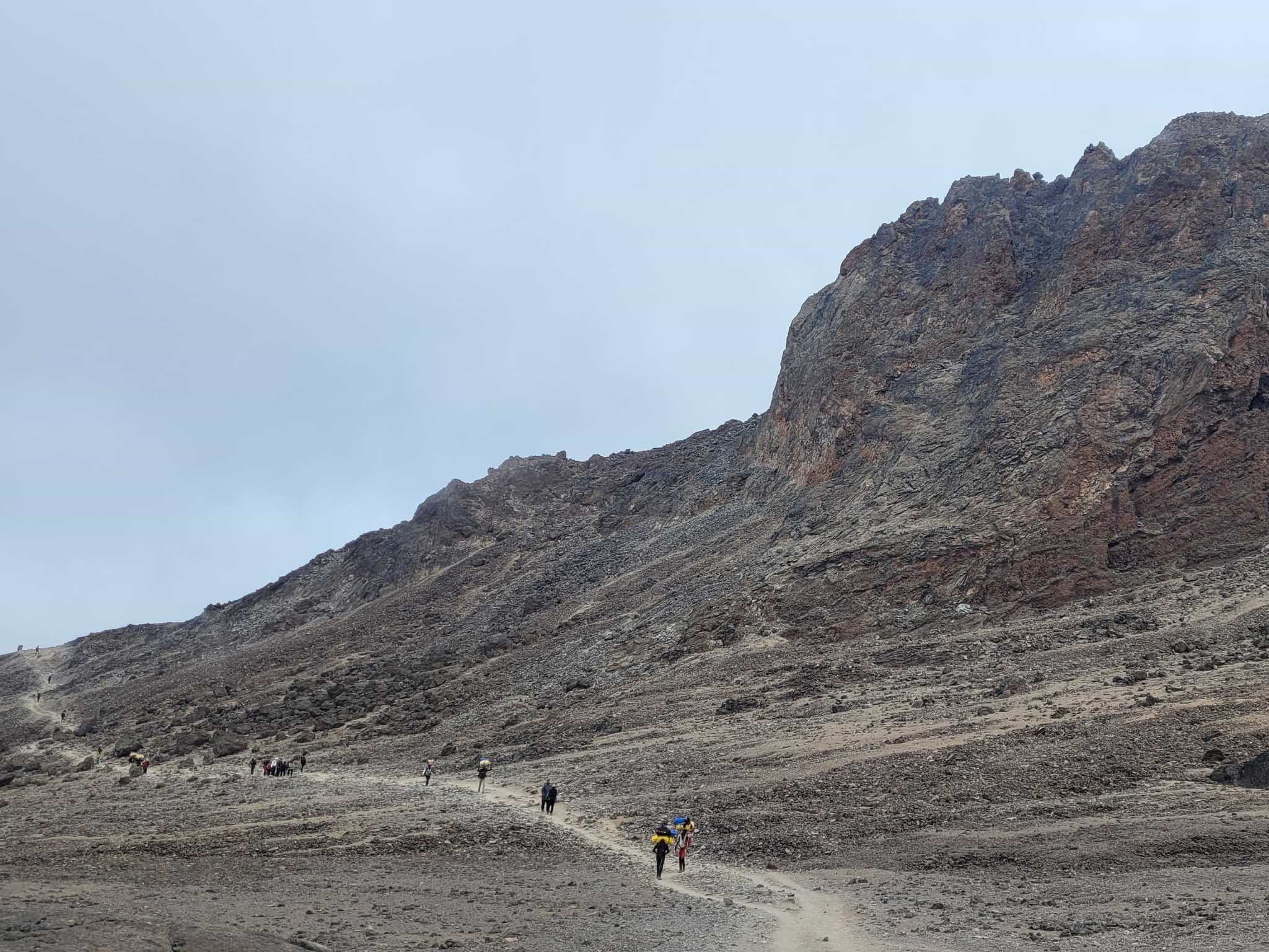 Trekkers on the way to Barafu Camp on the Machame Route up Kilimanjaro, Tanzania.