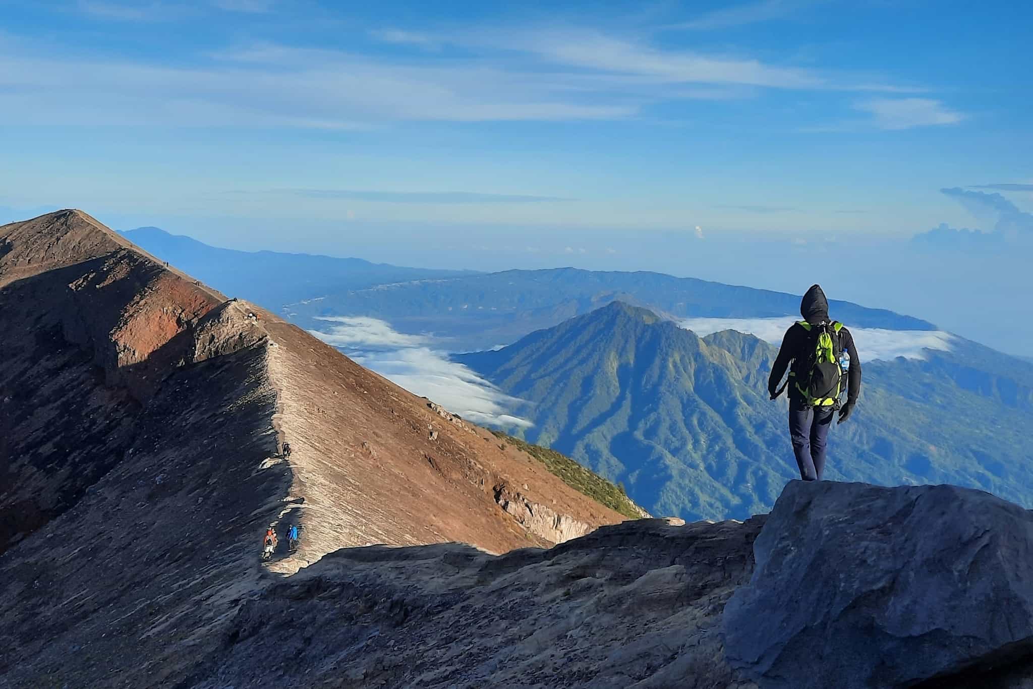 Trekker on the ridgline of Mount Agung, Shutterstock.
