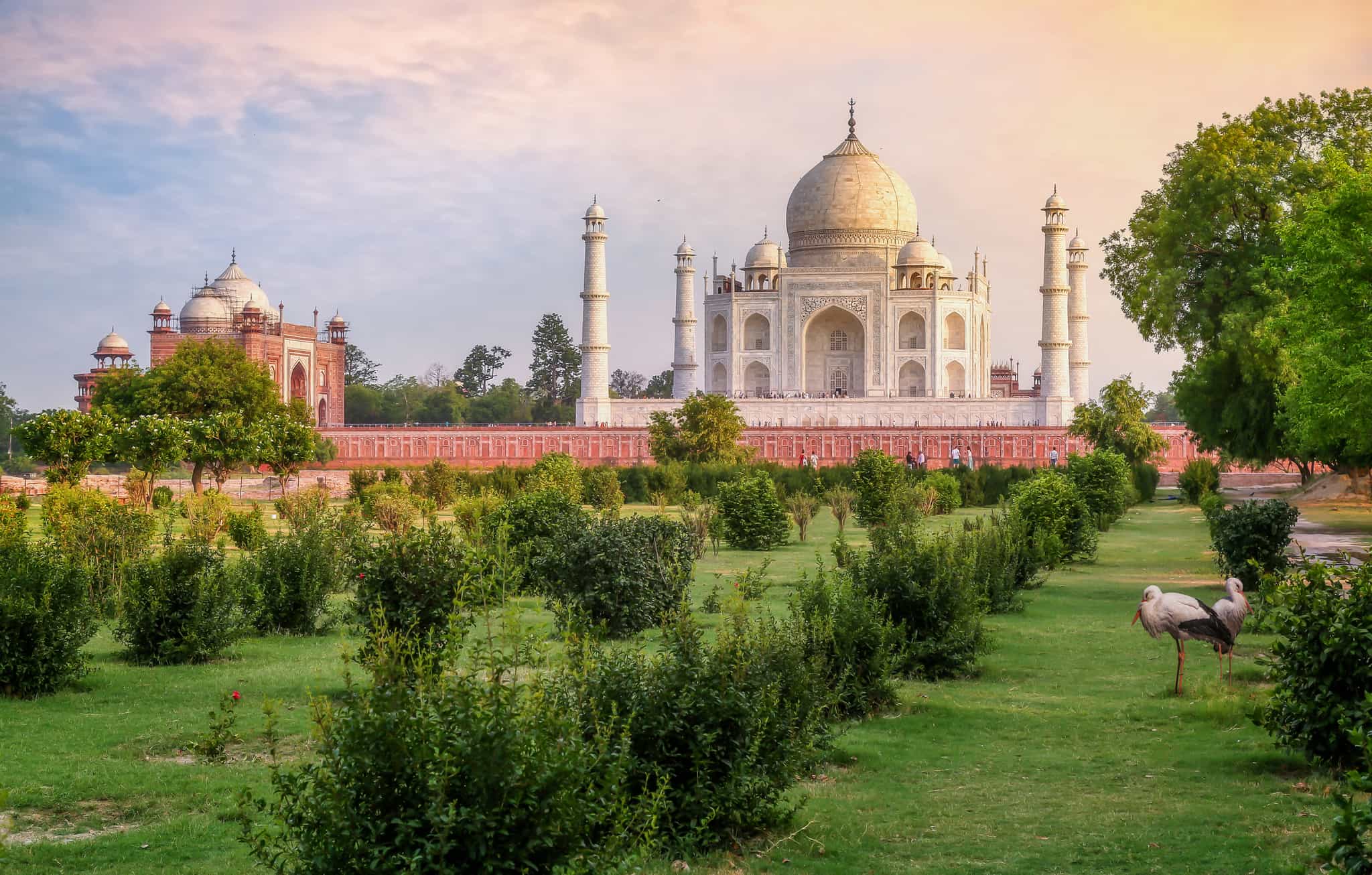 Taj Mahal historic monument at sunset as seen from Mehtab Bagh garden on the opposite side of the Yamuna river at Agra, India. Photo: GettyImages-1169496062