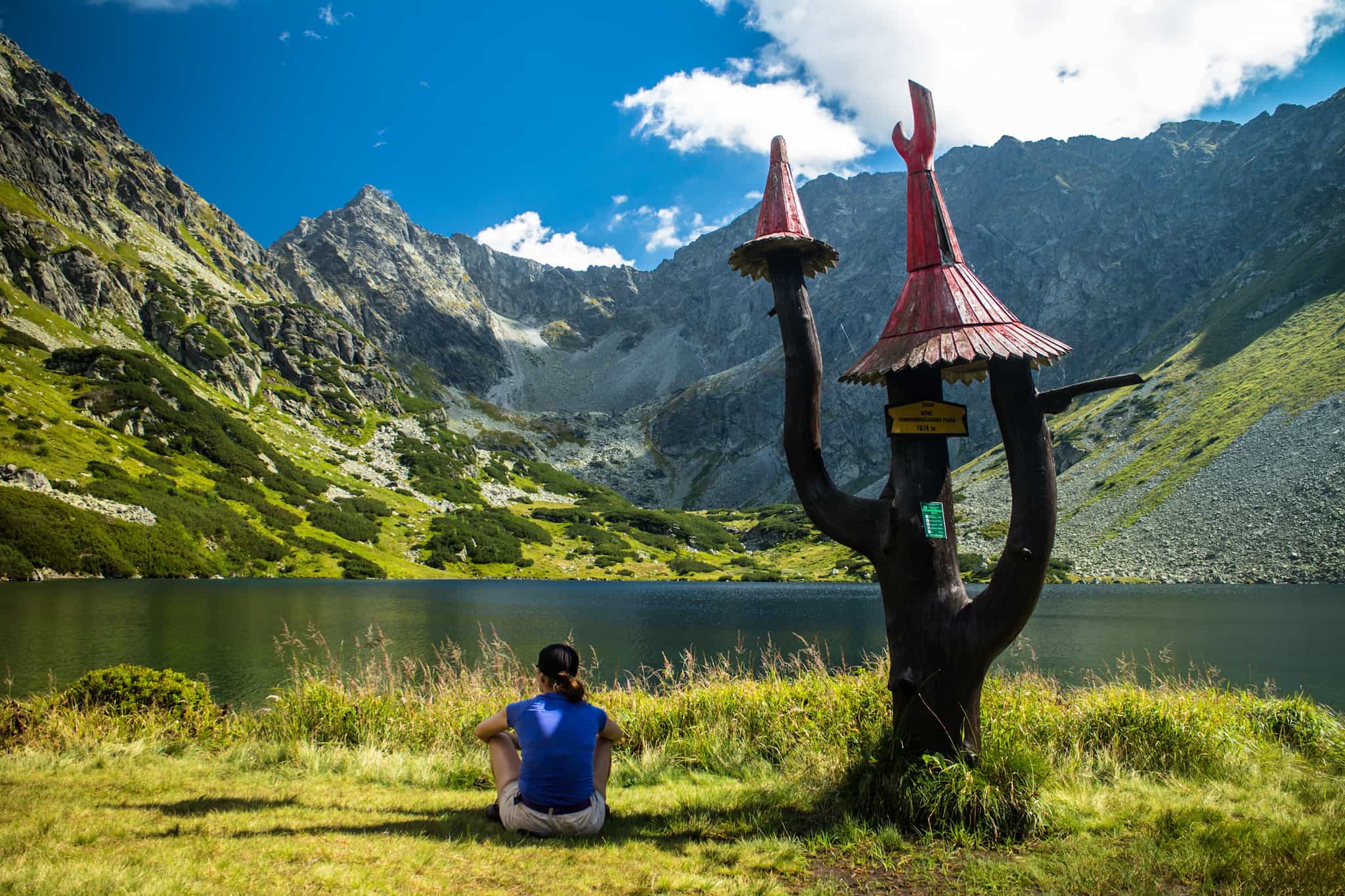 Hike rests by Temnosmrečianske Lake in the High Tatras