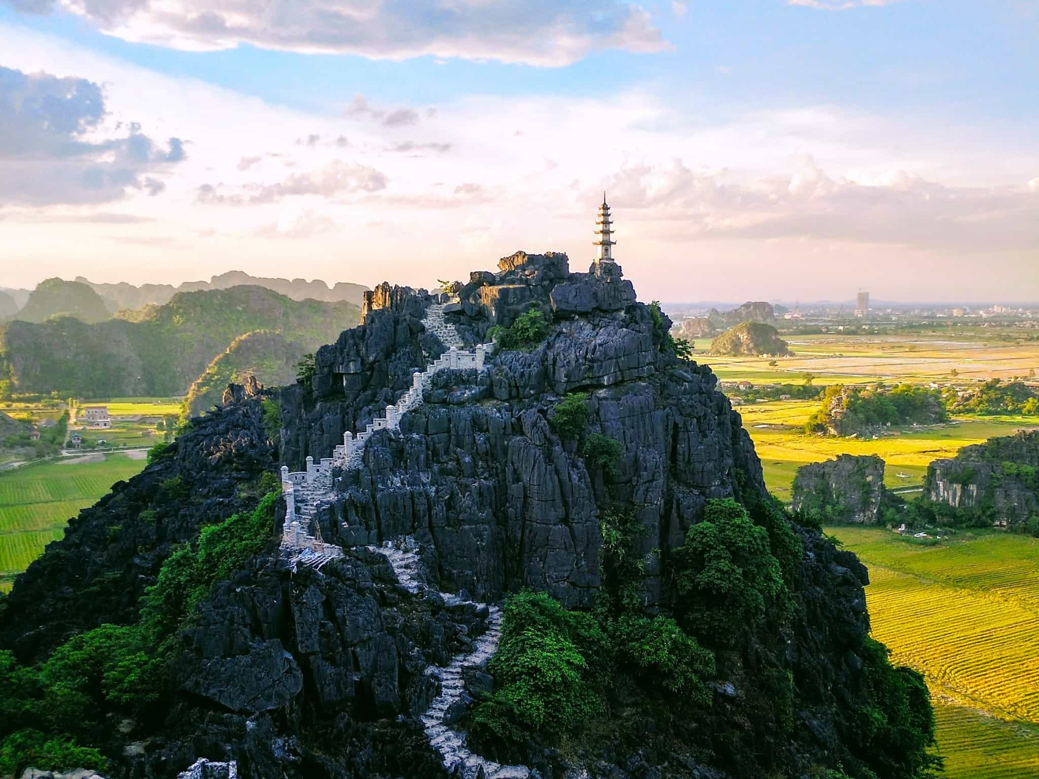 Bird's eye view of Mua Mountain, Ninh Binh, Vietnam. Photo: Unsplash-3VK6Urf2vE8 by @jcb23
https://unsplash.com/photos/birds-eye-view-photography-of-mountain-3VK6Urf2vE8