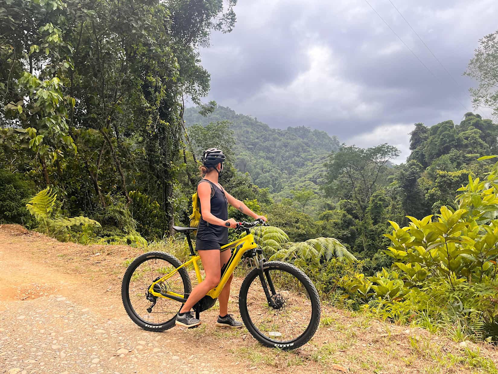 Woman on an ebike looking out across the view of Costa Rica