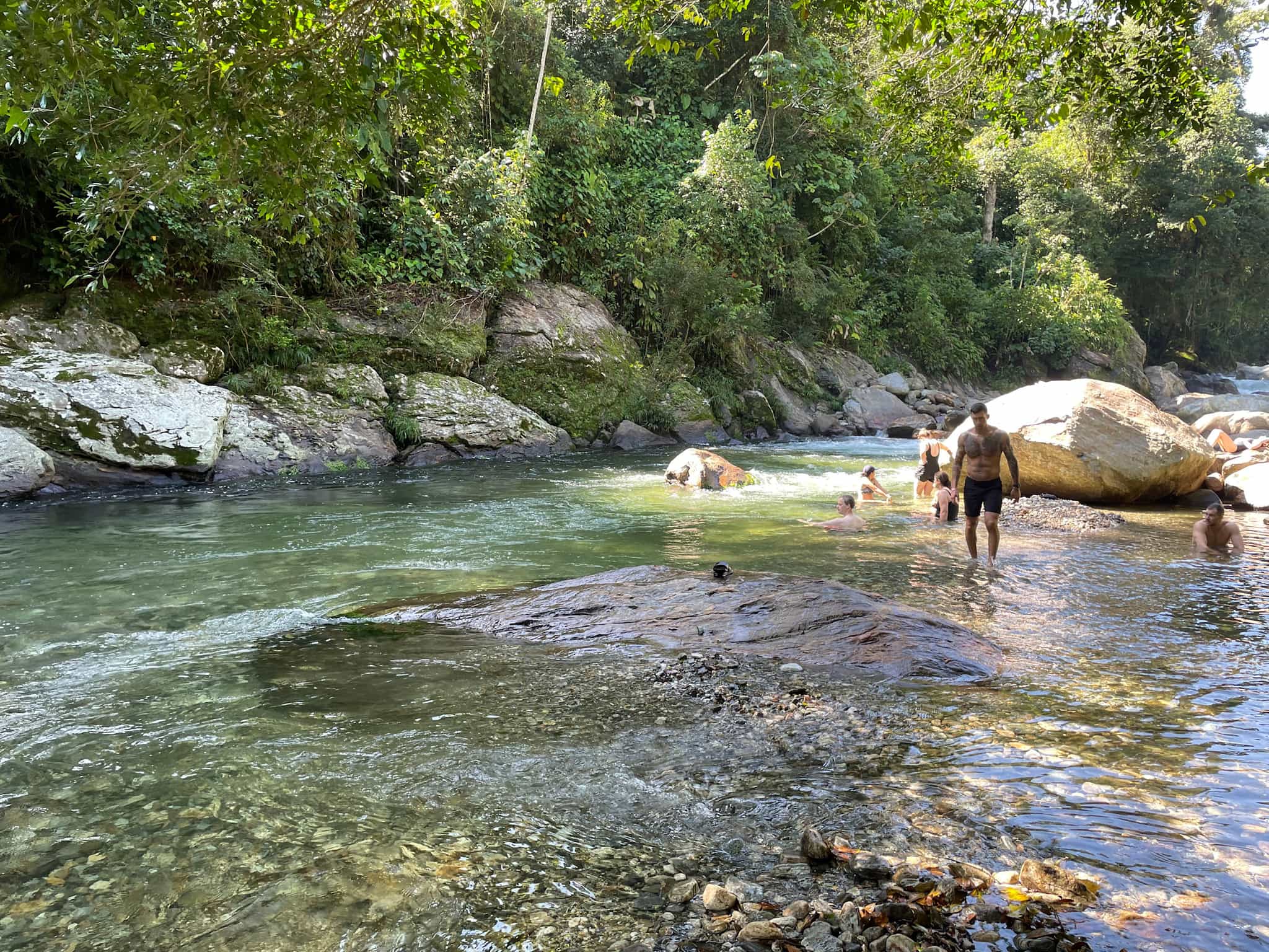 Swimming in a river along the Lost City Trek, Colombia.