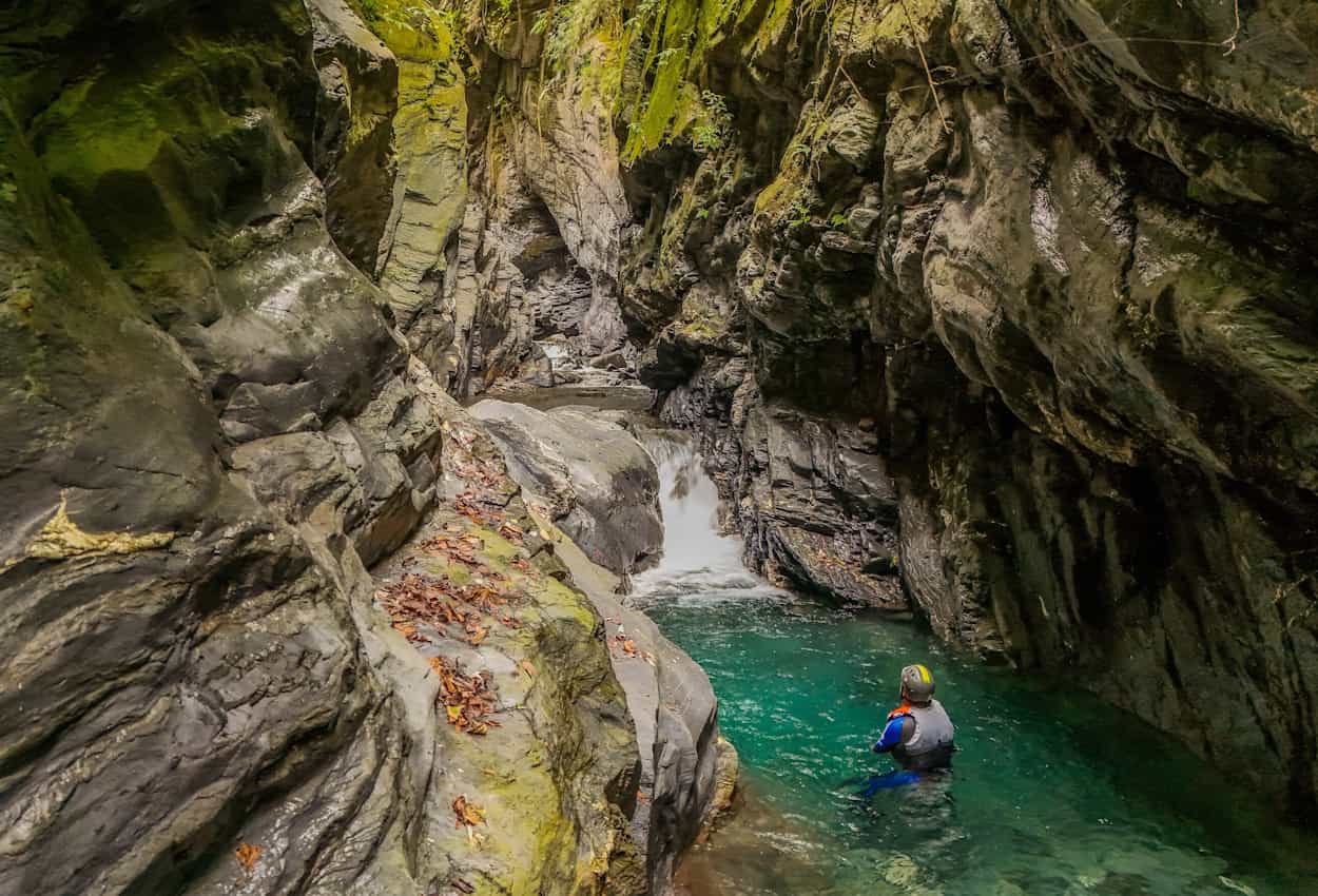 A person river tracing in the waters of Mulberry Creek, Taiwan.