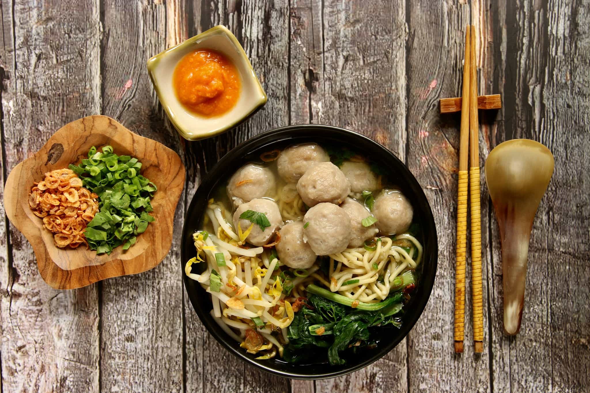 Mie Bakso. Popular Indonesian comfort food of egg noodles and meatballs soup.
