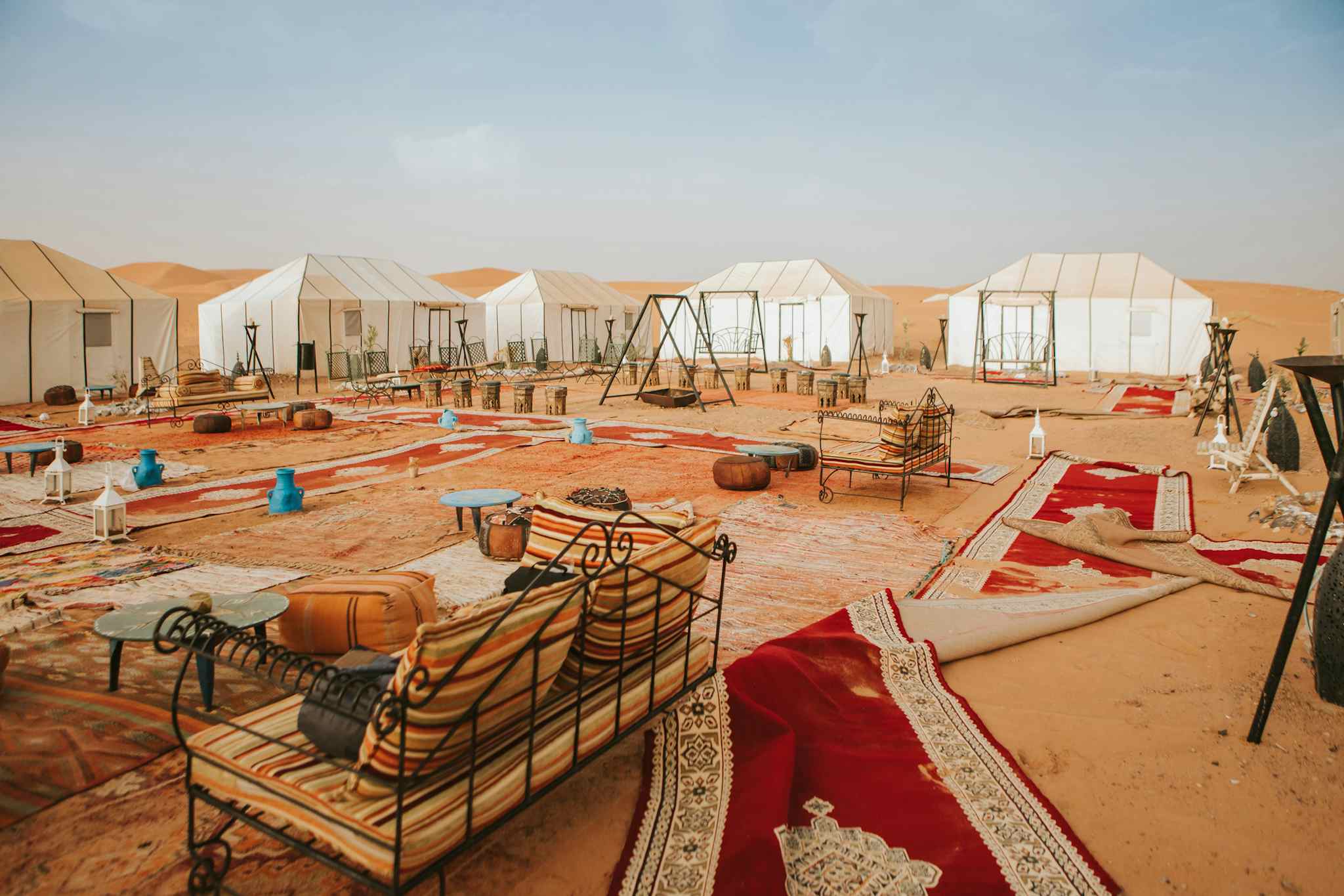 Beautiful desert camp courtyard at sunset, Morocco. Photo: GettyImages-1186914648