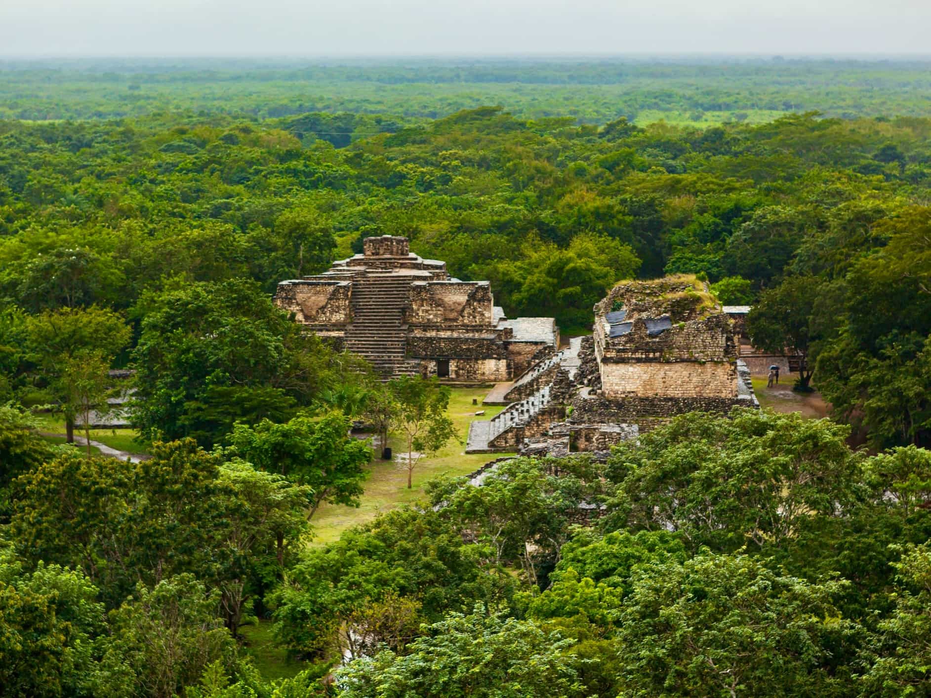 View of Ek Balam Mayan ruins surrounded by green jungle in Yucatan, Mexico