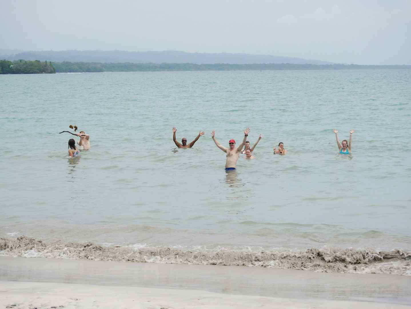 Happy people in the Caribbean Sea, Costa Rica.