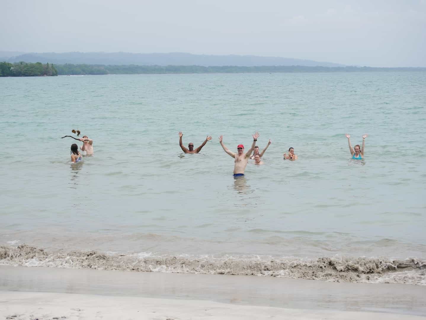 Happy people in the Caribbean Sea, Costa Rica.