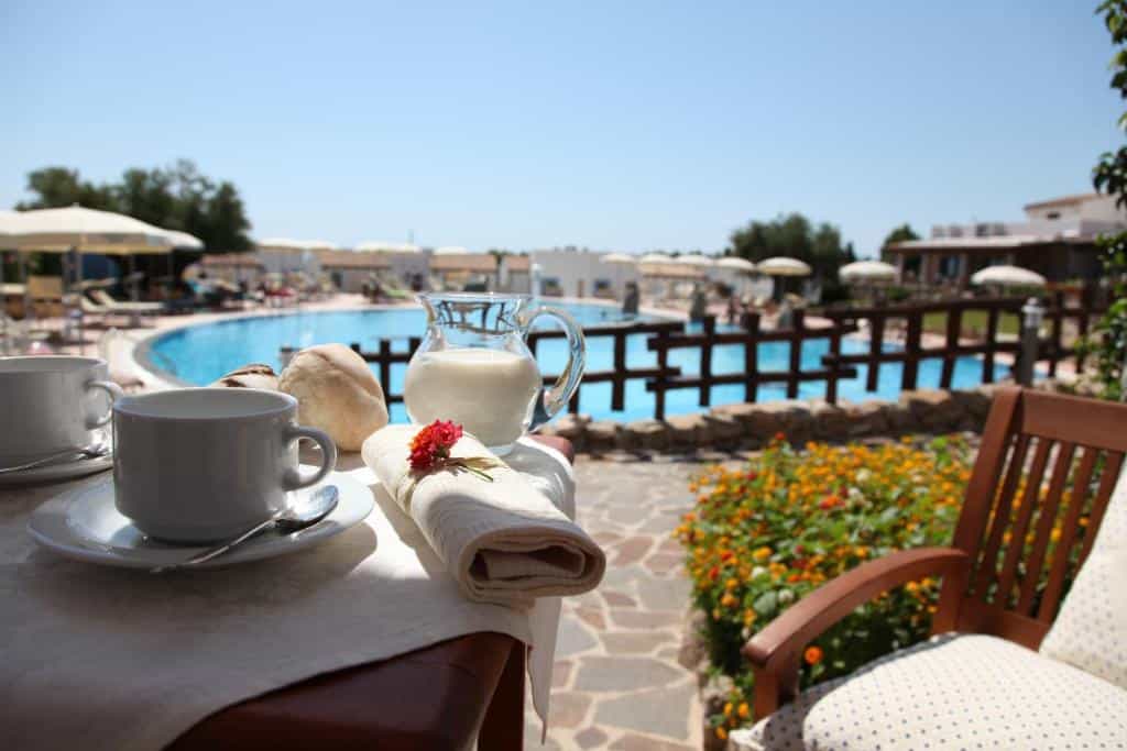 Breakfast By The Pool At Hotel Nuraghe Arvu - Photo/Hotel