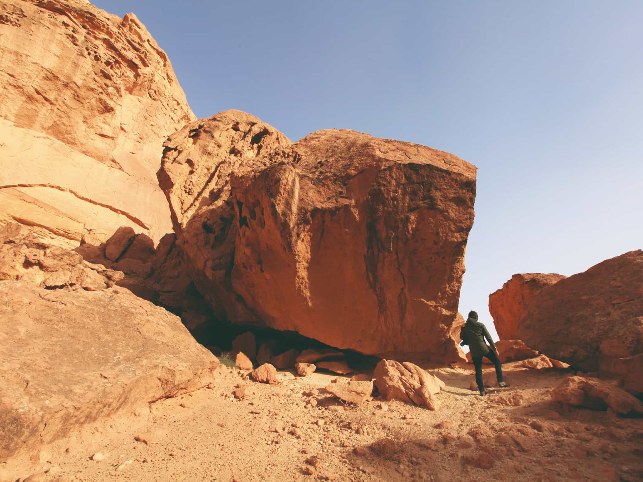 Person hiking in the Chebika canyon, Tunisia.