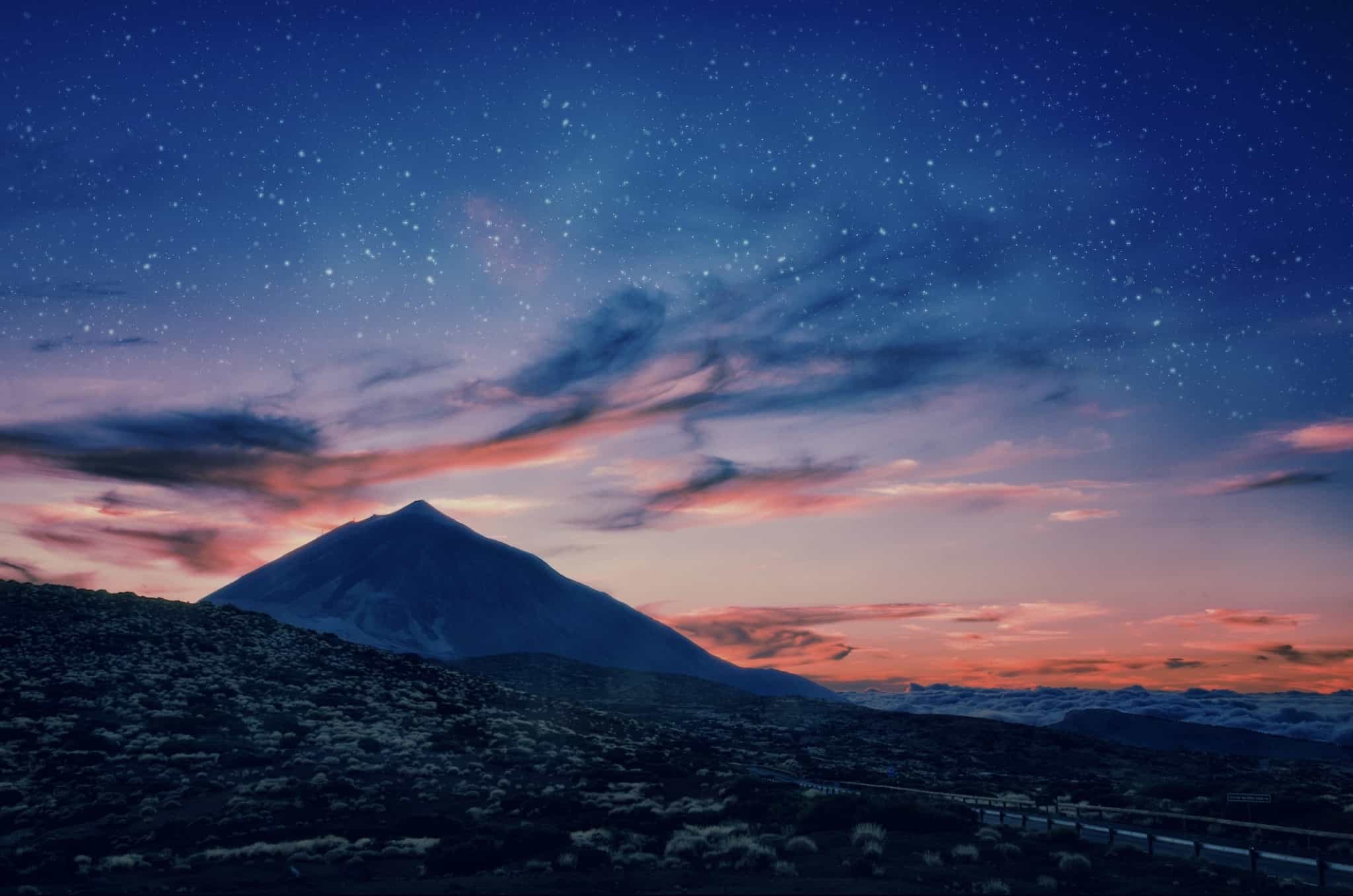 Silhouette of volcano del Teide against a sunset sky in Tenerife