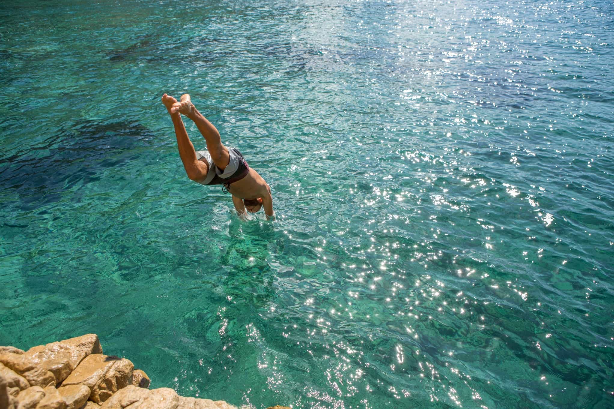 Swimming in Sardinia. Photo: GettyImages-636791818
