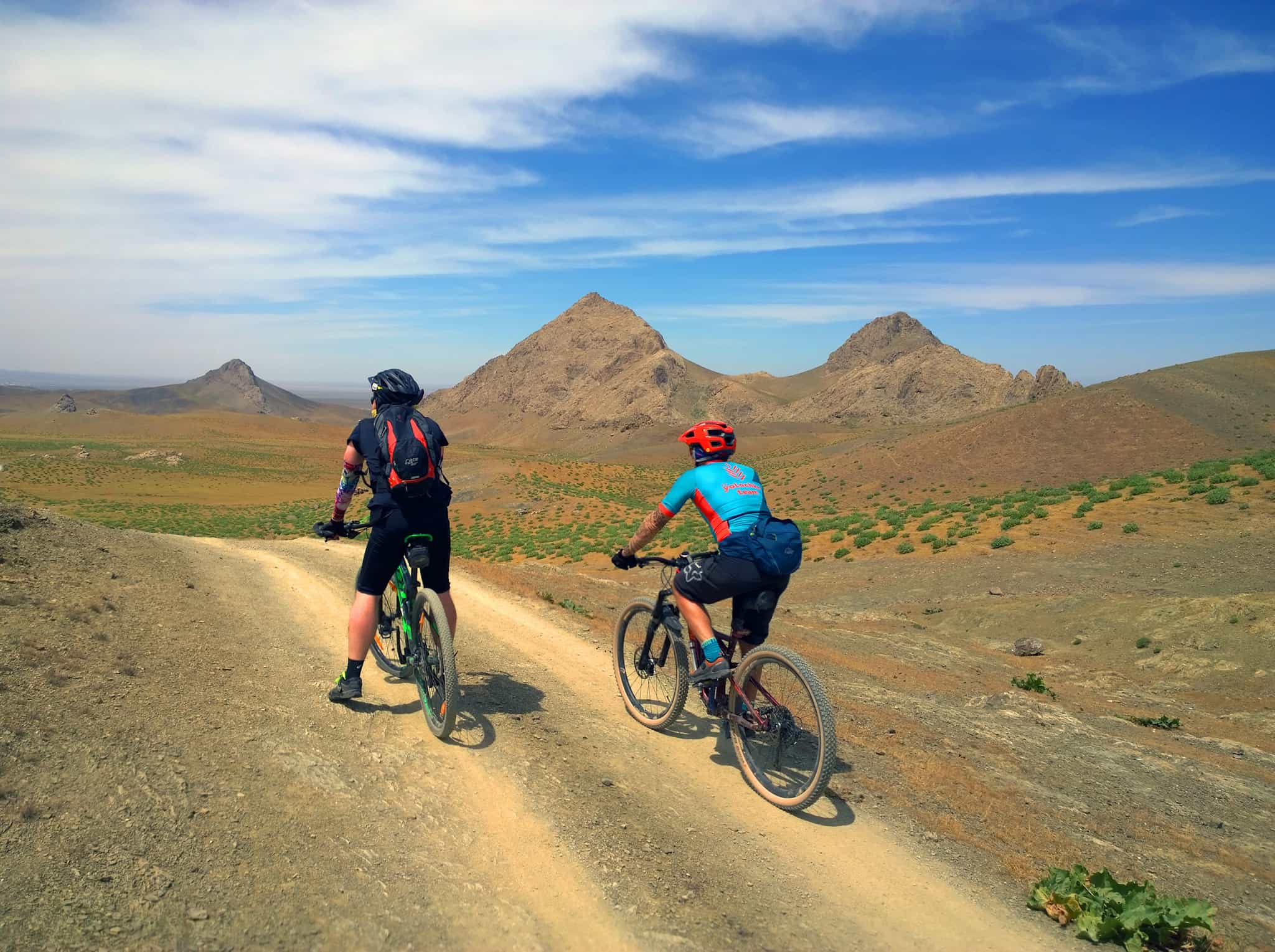 Riding along a ridge between the Nuratau Mountains and the desert steppe, Uzbekistan