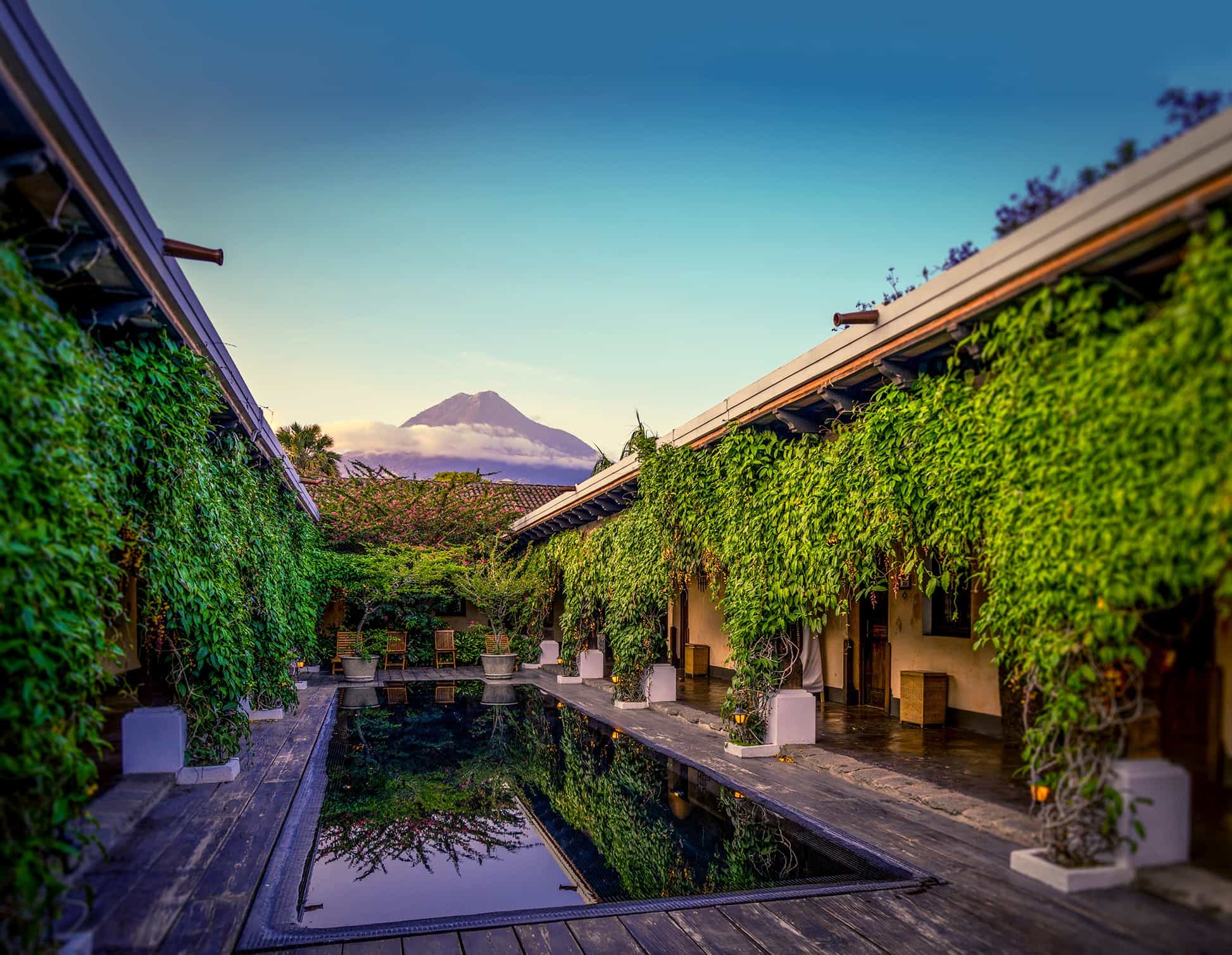 Pool with volcano view in Antigua, Guatemala at the Porta Hotel