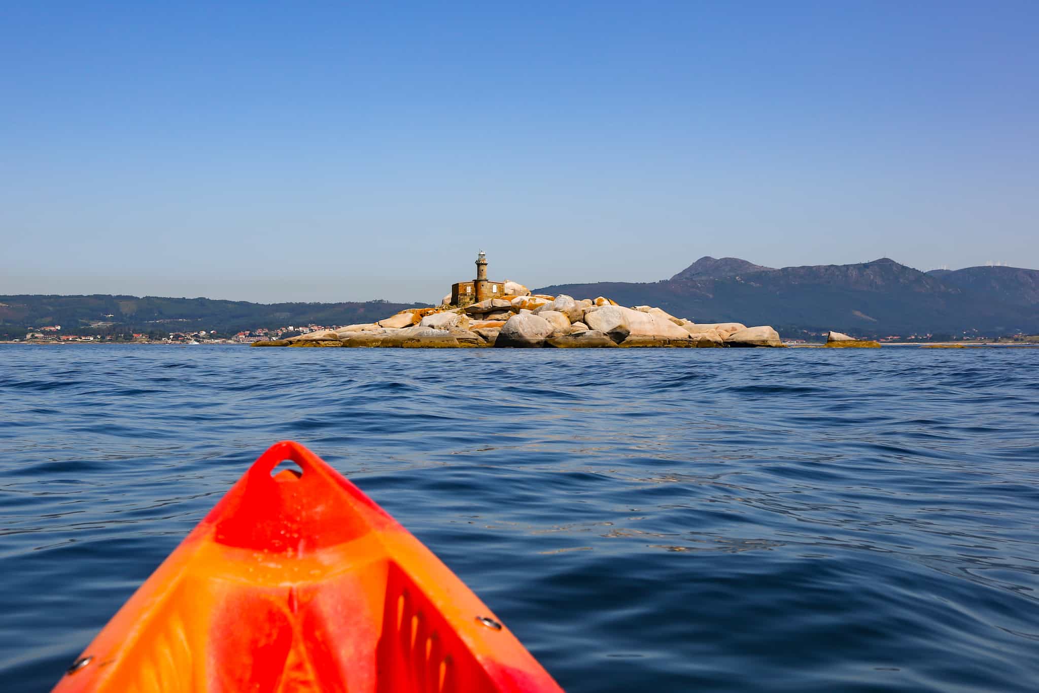 Kayak on a section of the Camino del Mar, Galicia, Spain.