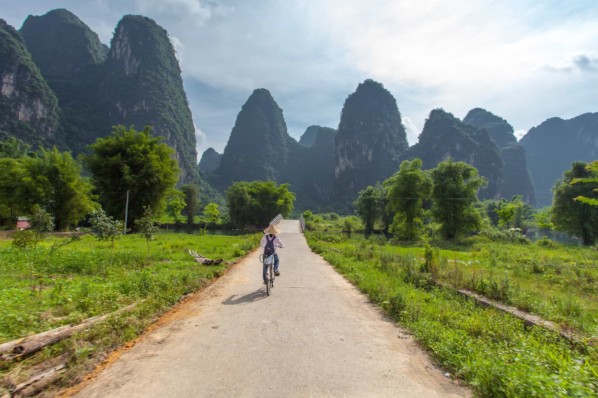 Cycling in Yangshuo countryside. Photo: shutterstock 149186150