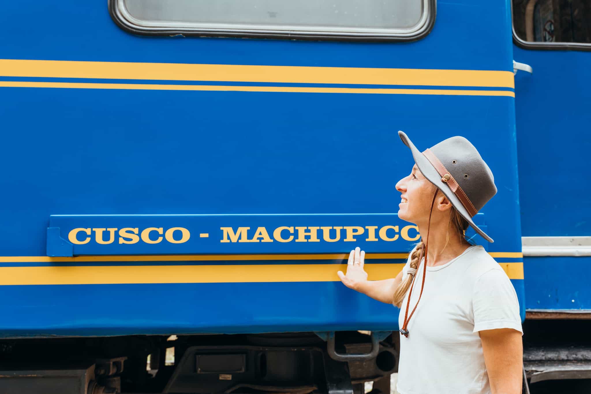 Traveller touching the Cusco to Machu Picchu train