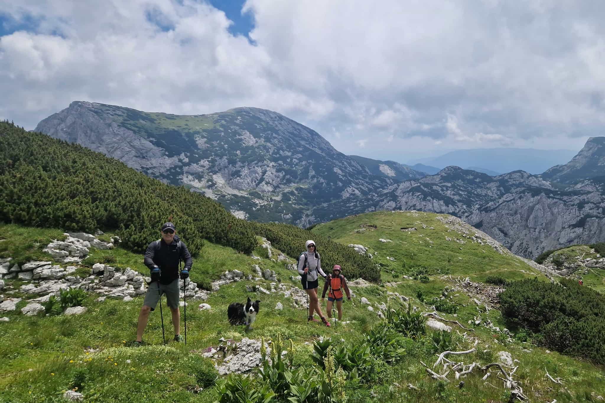 Small group hiking up Kompetla in the Julian Alps