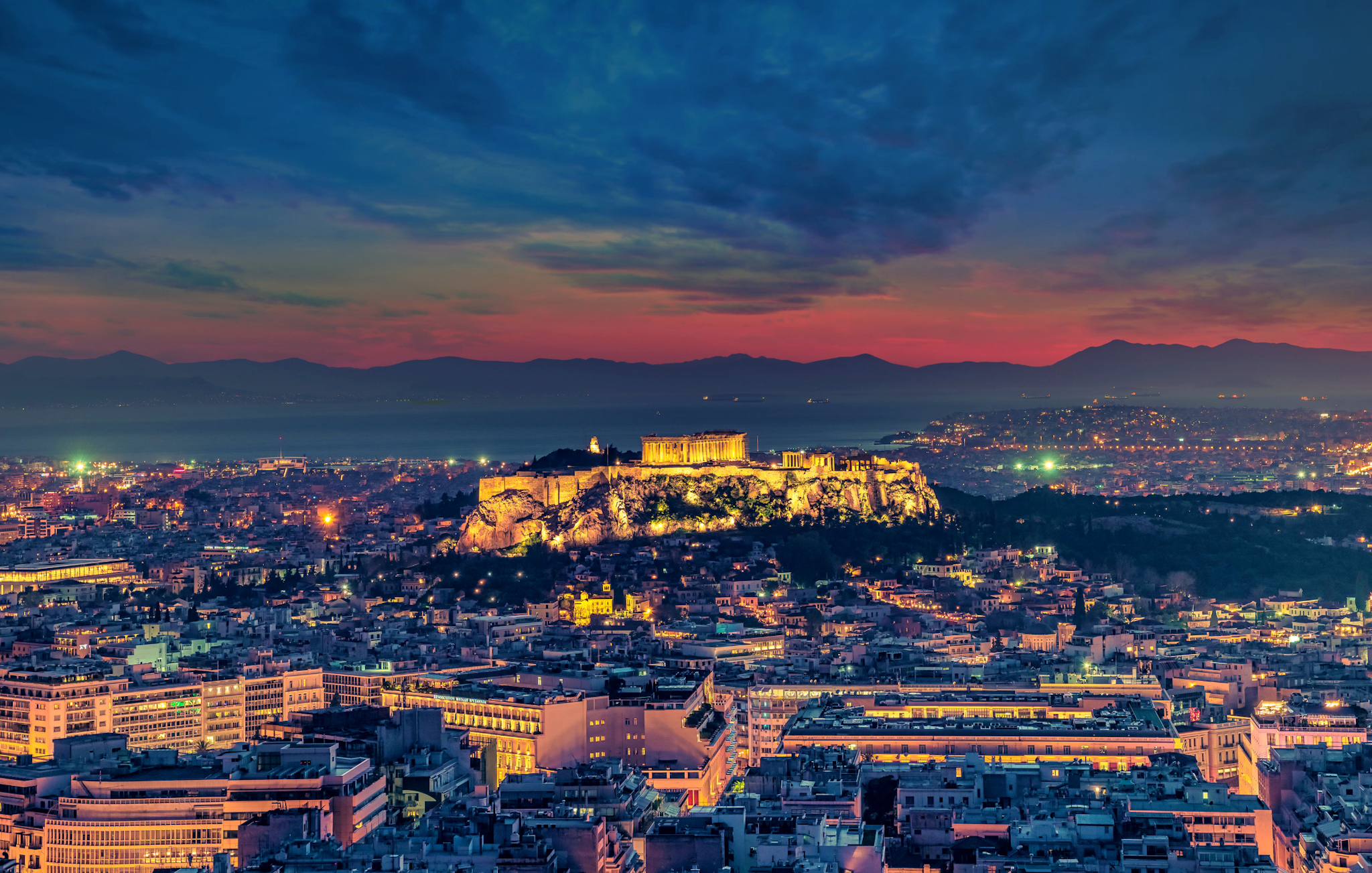 Acropolis Athens Sunset Greece
Canva - https://www.canva.com/photos/MAETqAUWo2Y-city-with-high-rise-buildings-under-orange-and-blue-sky/