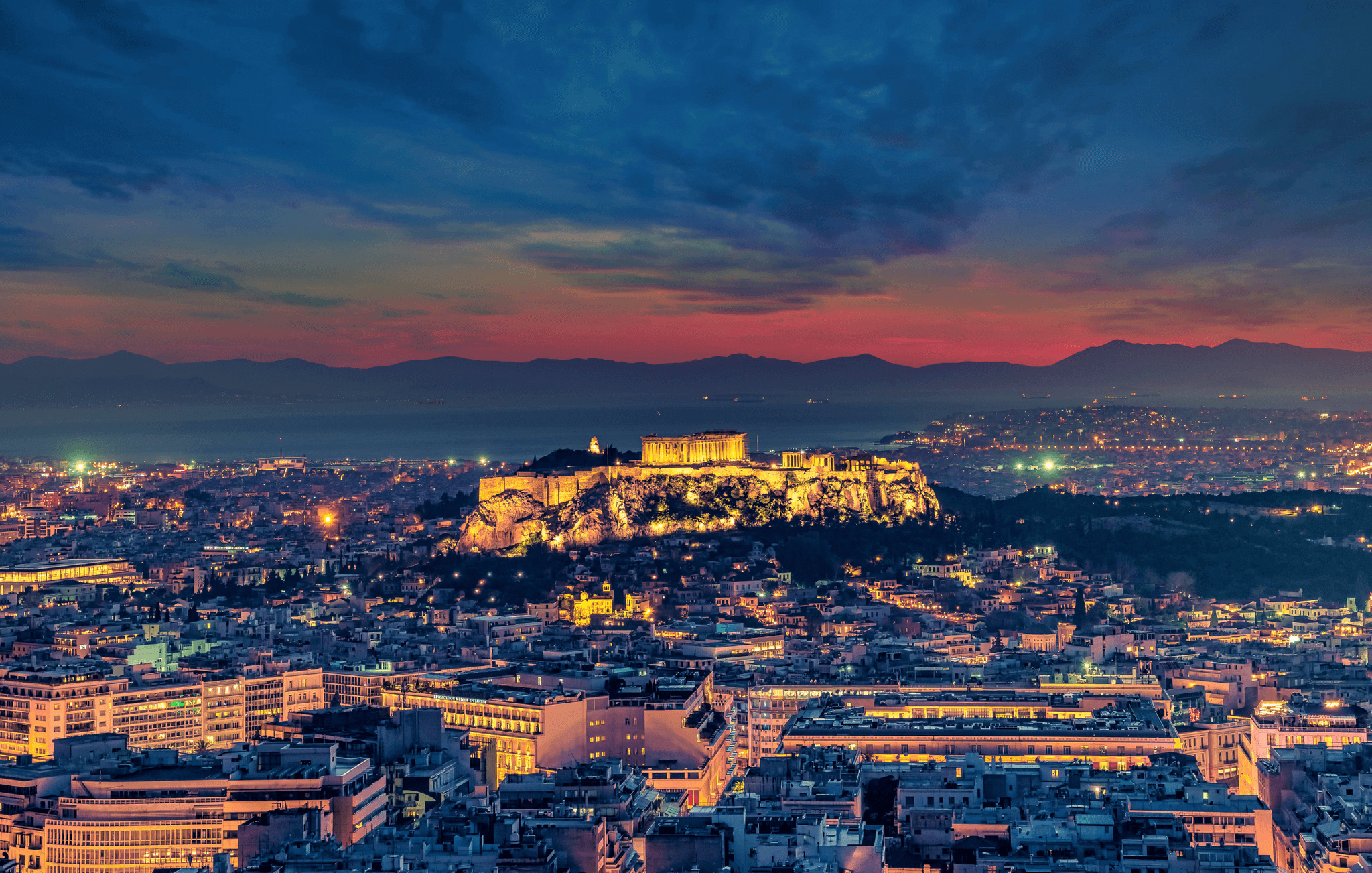 Acropolis Athens Sunset Greece
Canva - https://www.canva.com/photos/MAETqAUWo2Y-city-with-high-rise-buildings-under-orange-and-blue-sky/