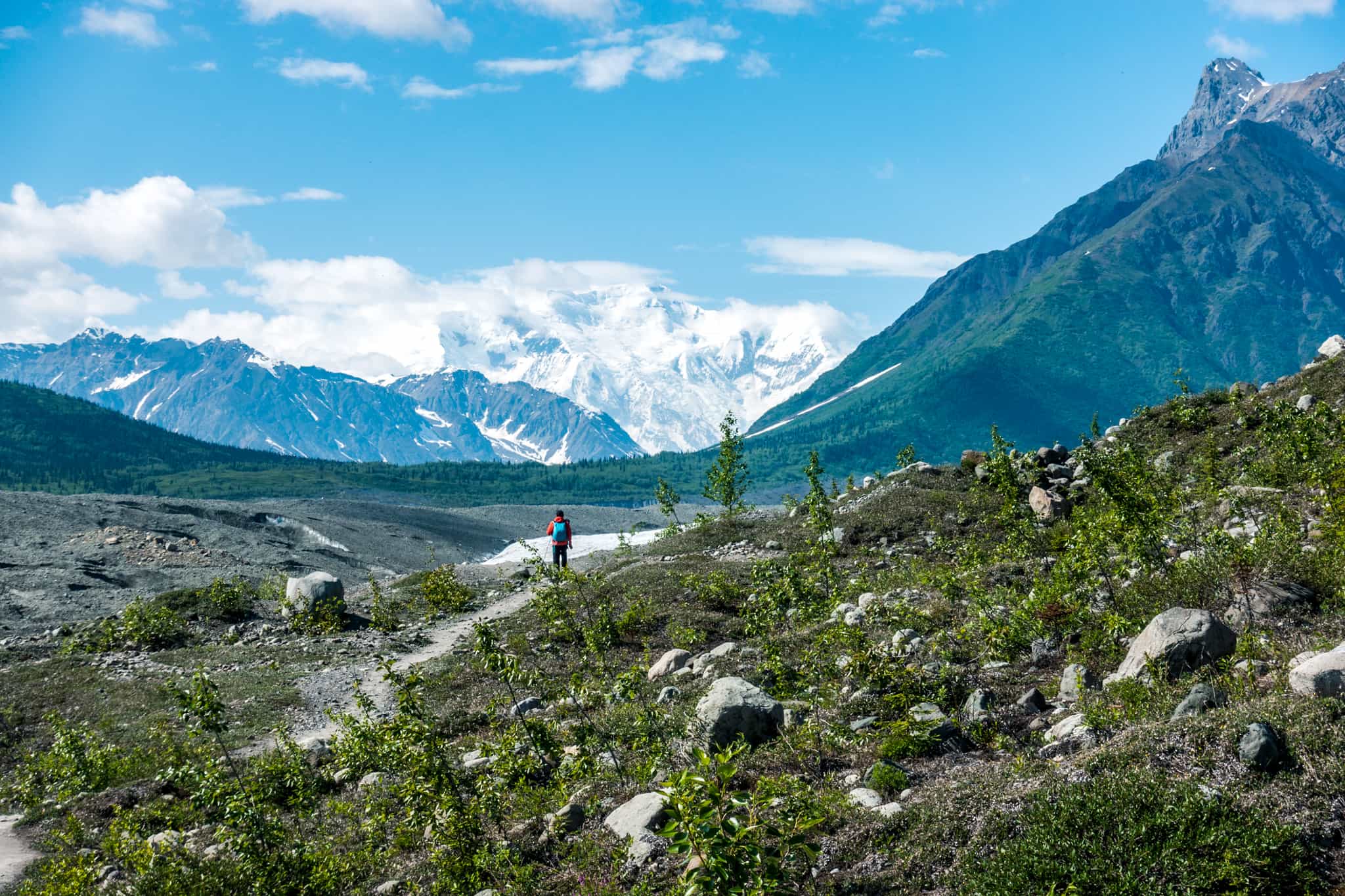 Wrangell St Elias, Alaska, USA 
Getty: 1405496496
Hikers in the Wrangell-St. Elias National Park & Preserve