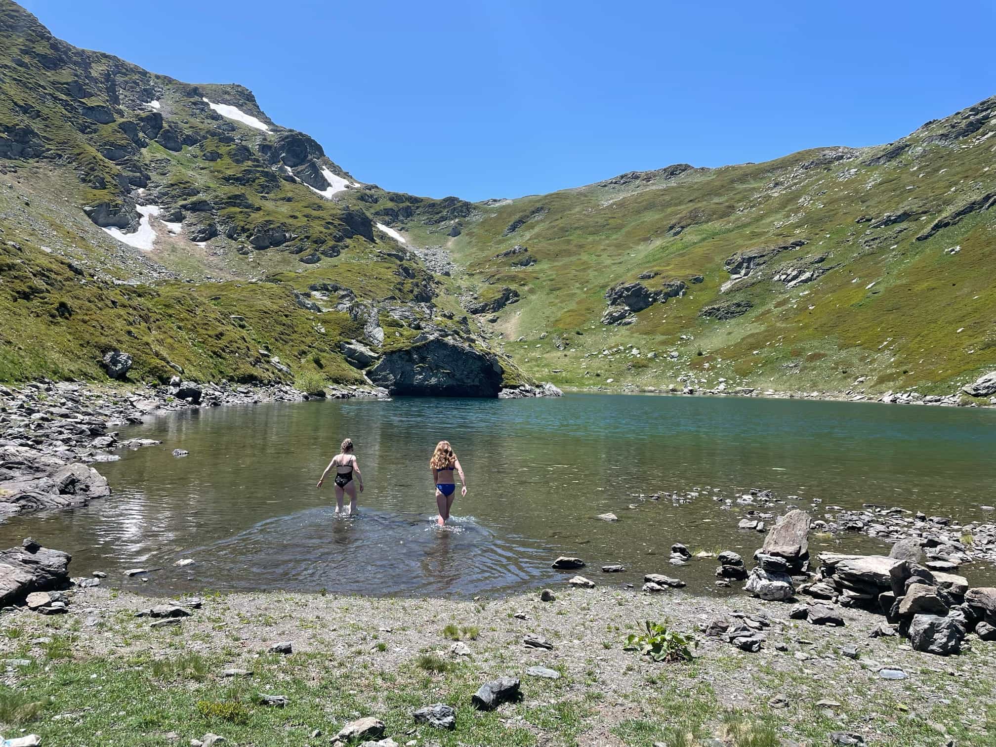 Two swimmers taking a dip in the Sharr Mountains.