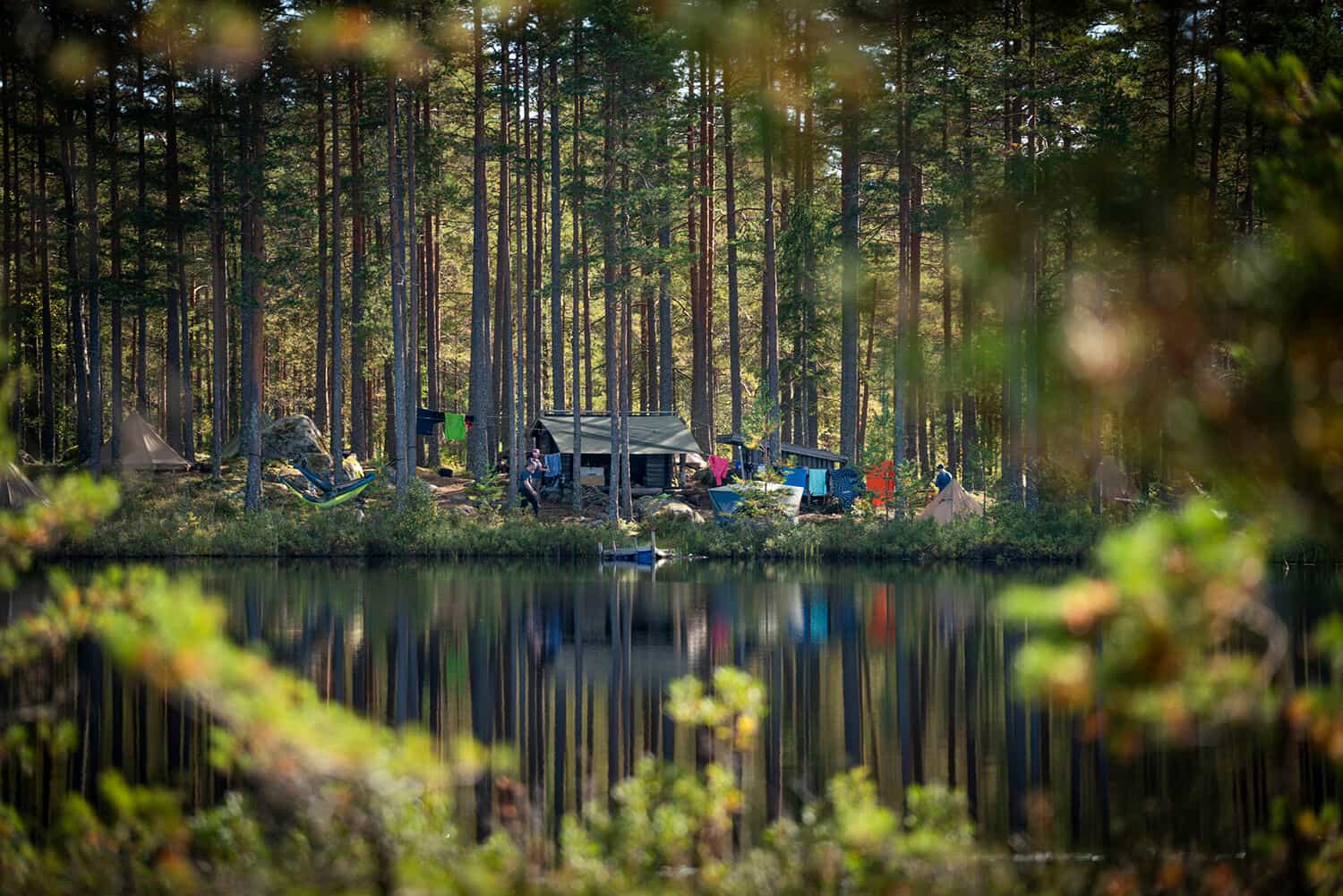 A lakeside wilderness camp in the forest, Sweden.