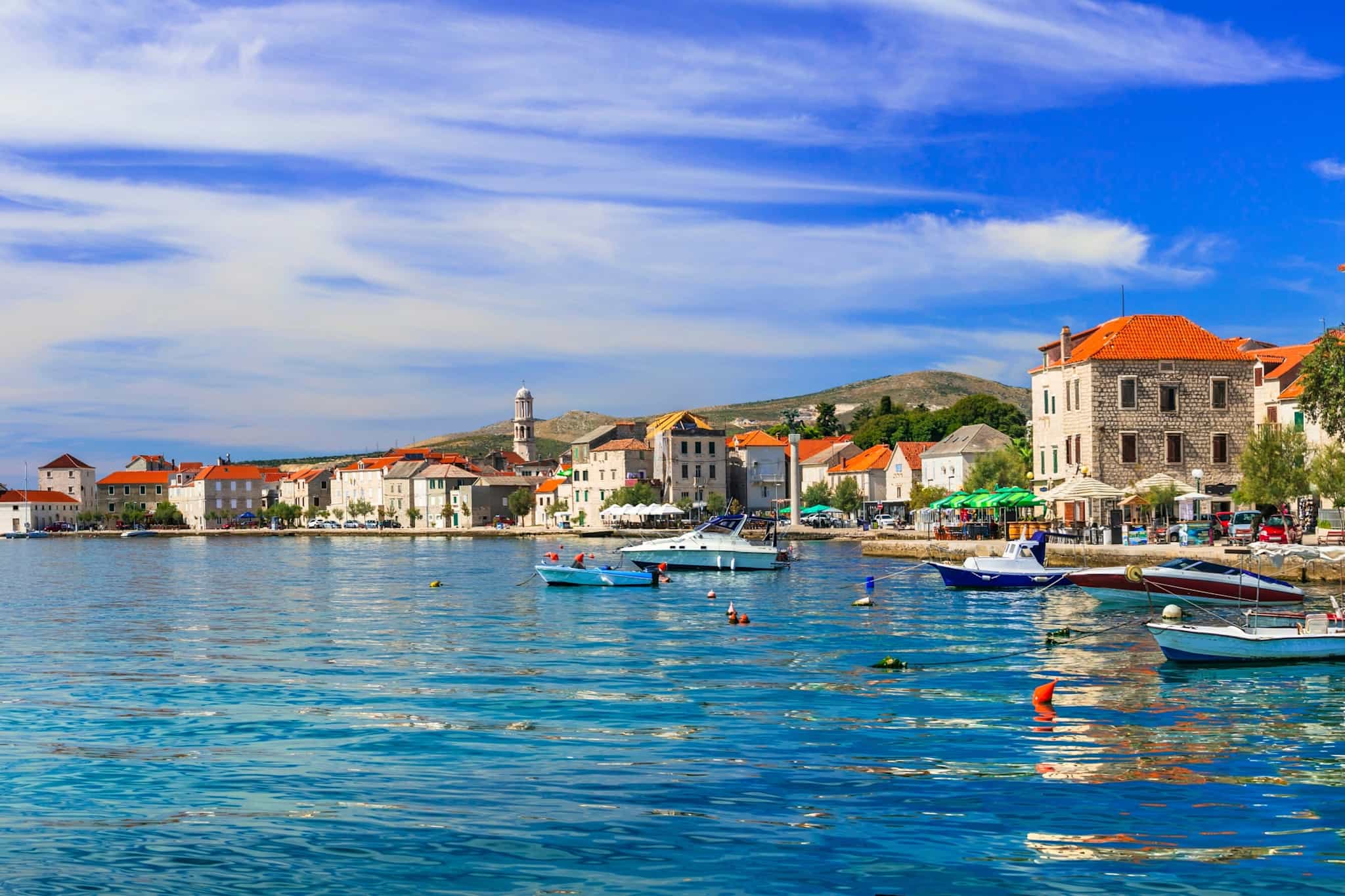 Traditional coastal village Kastel Stari with colorful fishing boats, Central Dalmatia, Croatia